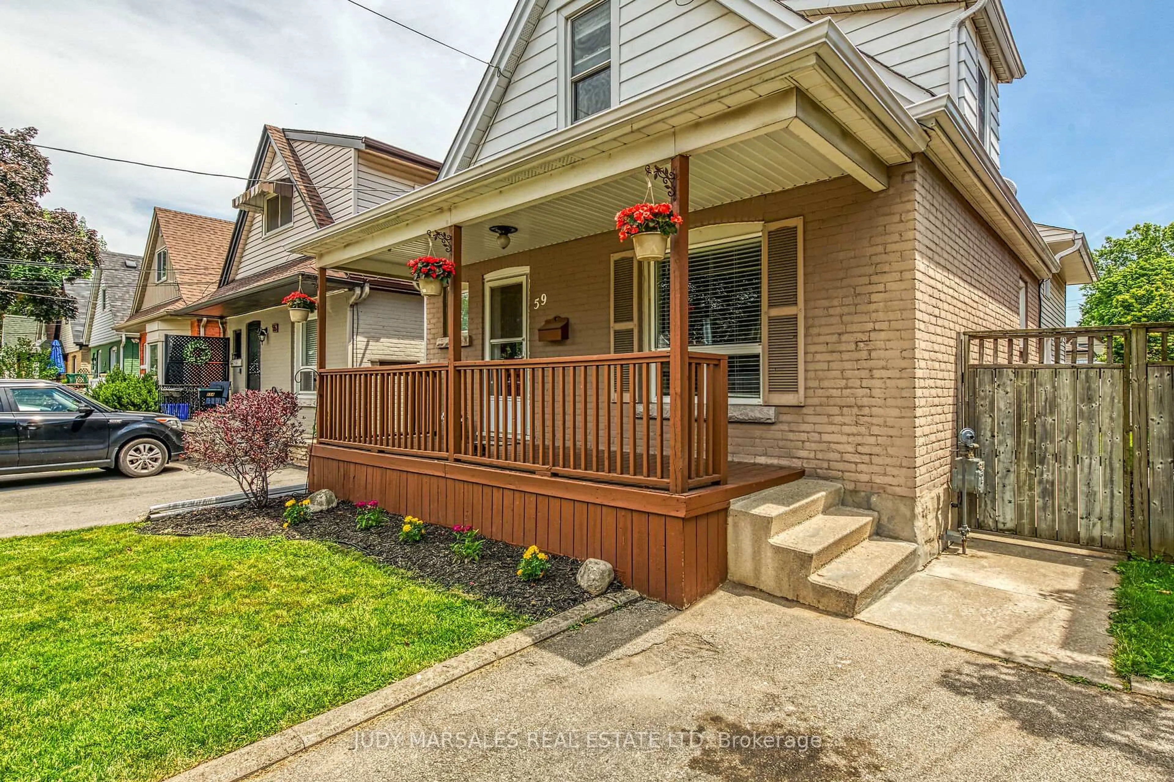 Home with brick exterior material, street for 59 East 26th St, Hamilton Ontario L8V 3C3