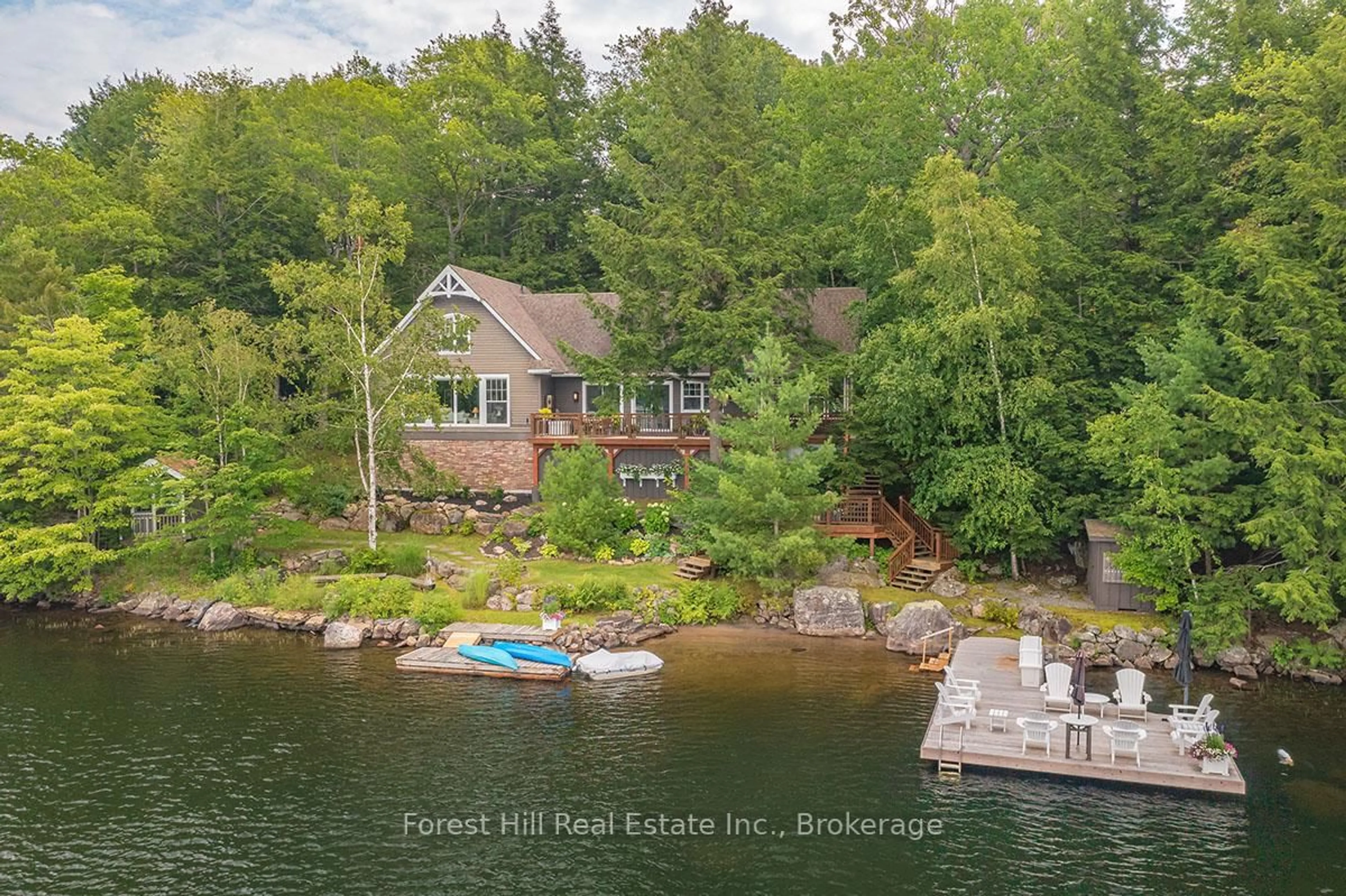 A pic from outside/outdoor area/front of a property/back of a property/a pic from drone, water/lake/river/ocean view for 1064 Long Lake Rd, Muskoka Lakes Ontario P0C 1A0