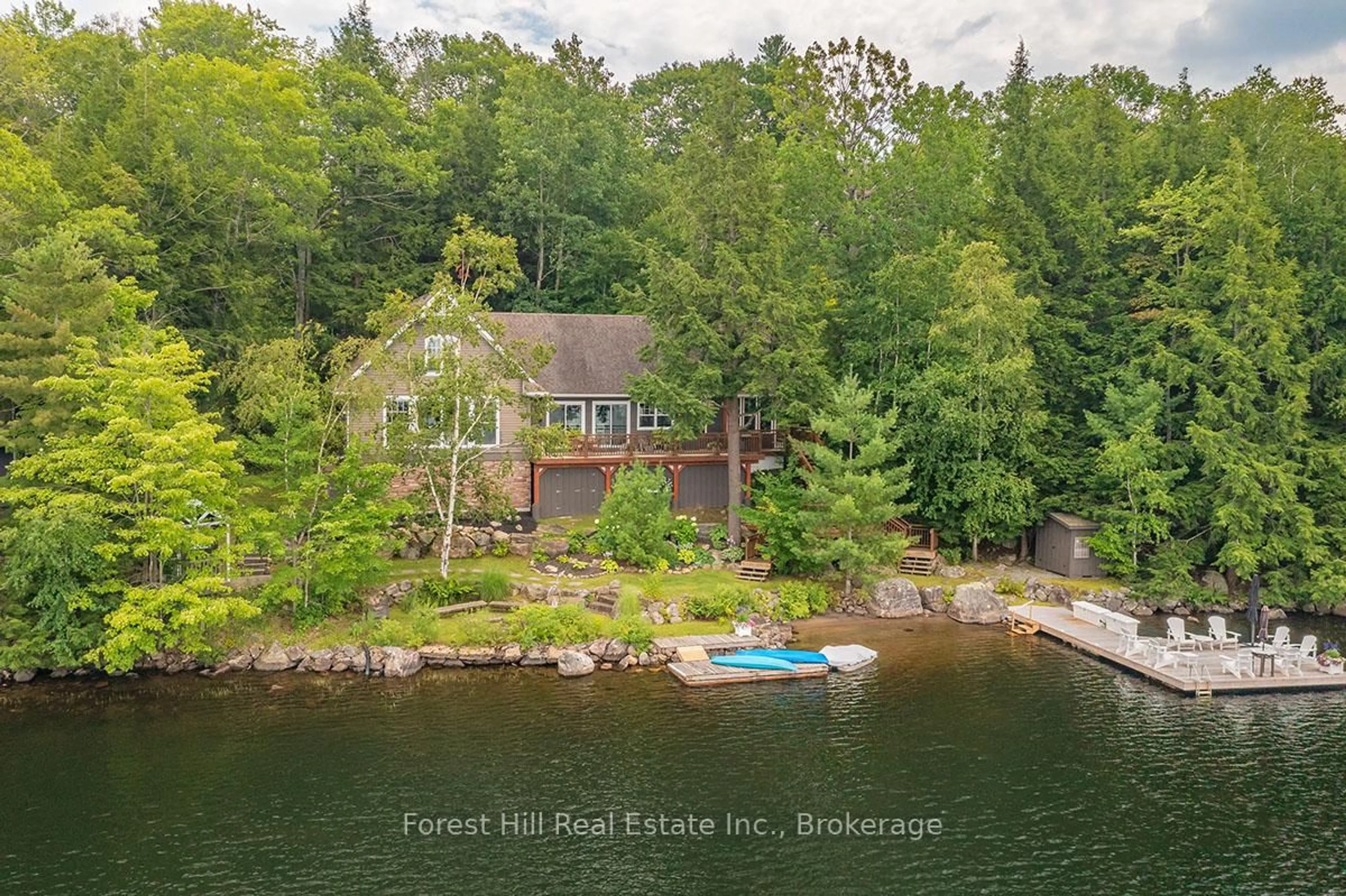 A pic from outside/outdoor area/front of a property/back of a property/a pic from drone, water/lake/river/ocean view for 1064 Long Lake Rd, Muskoka Lakes Ontario P0C 1A0
