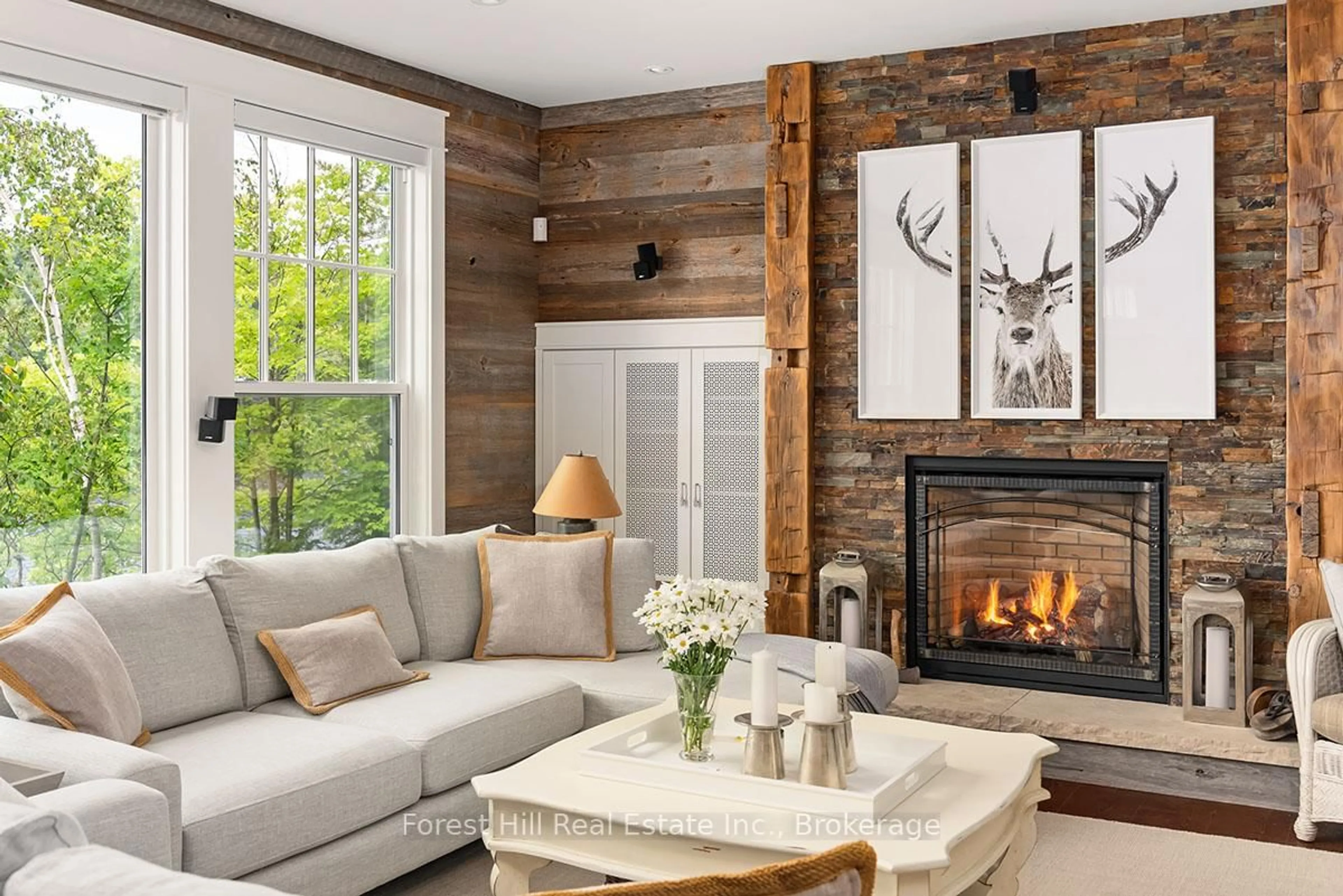 Living room with furniture, wood/laminate floor for 1064 Long Lake Rd, Muskoka Lakes Ontario P0C 1A0