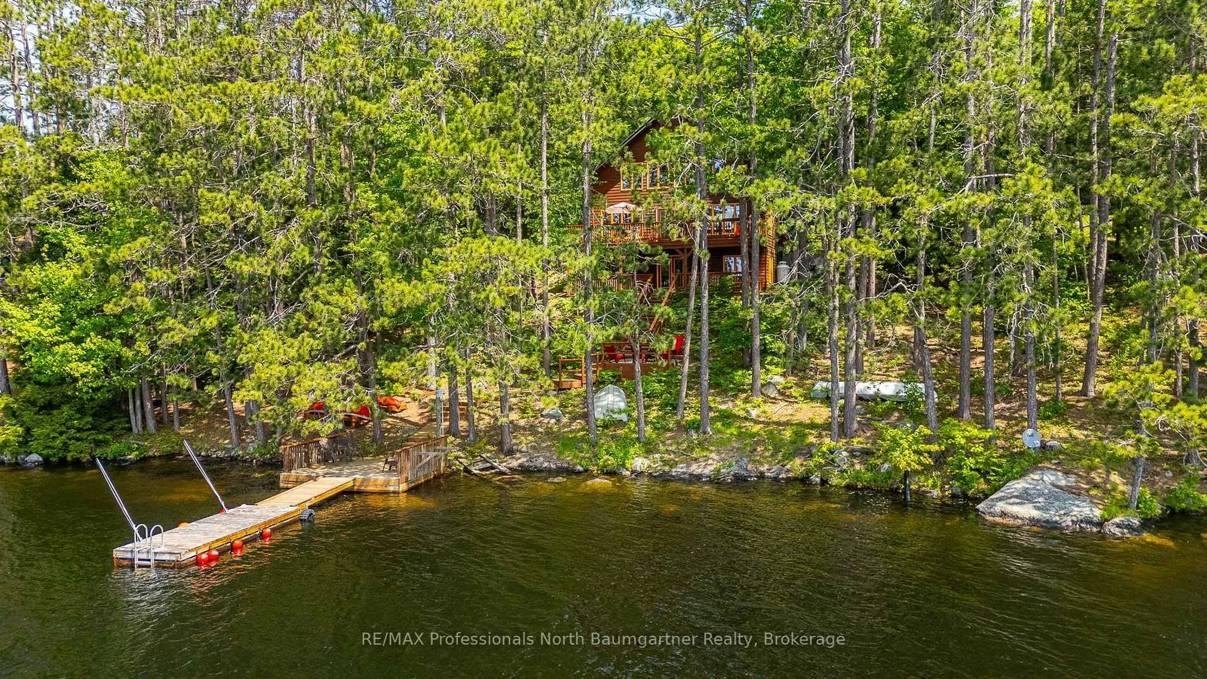 A pic from outside/outdoor area/front of a property/back of a property/a pic from drone, water/lake/river/ocean view for 1786 Fallowfield Rd, Highlands East Ontario K0M 1S0