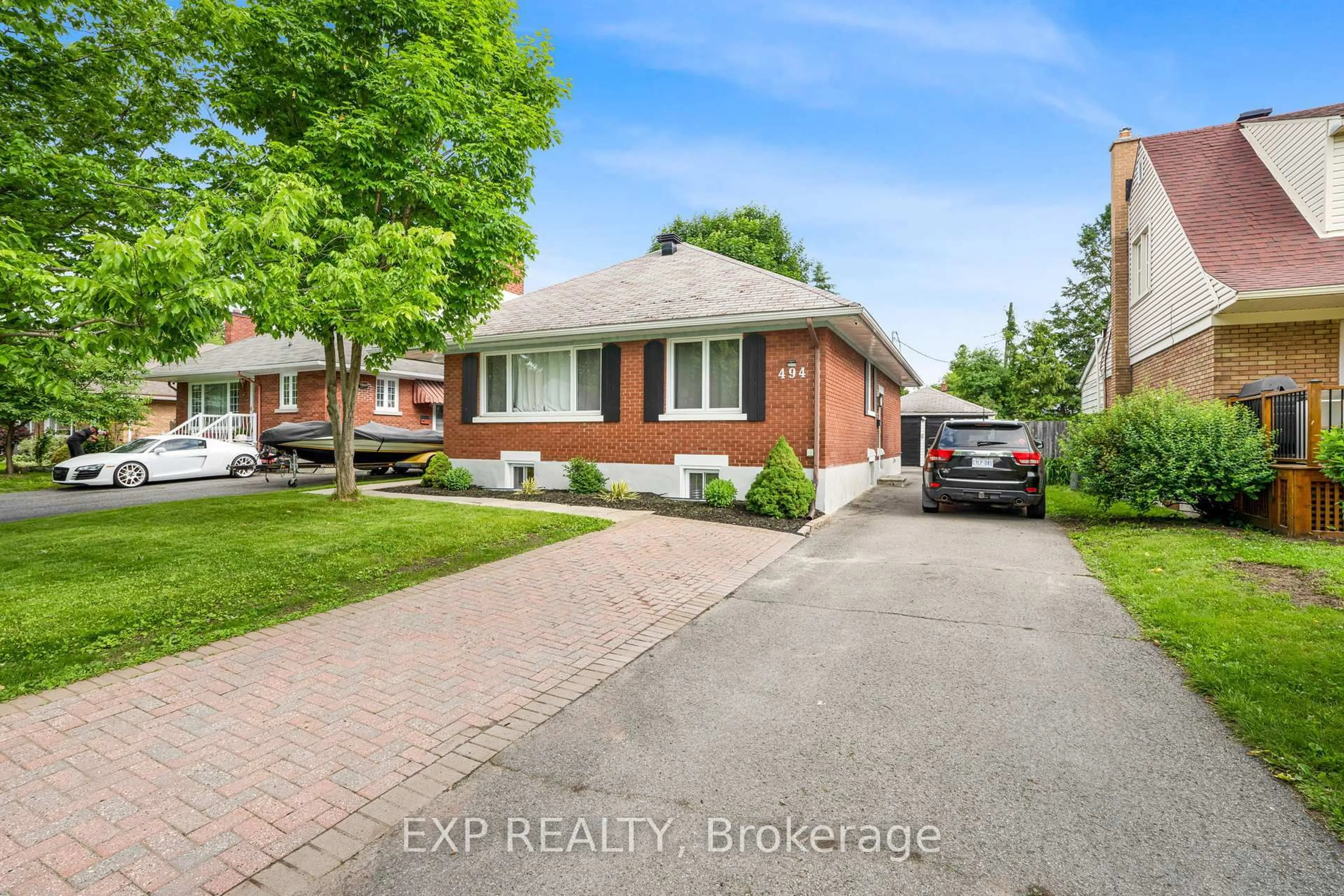 Home with brick exterior material, street for 494 Wolffdale Cres, Ottawa Ontario K1K 1N5