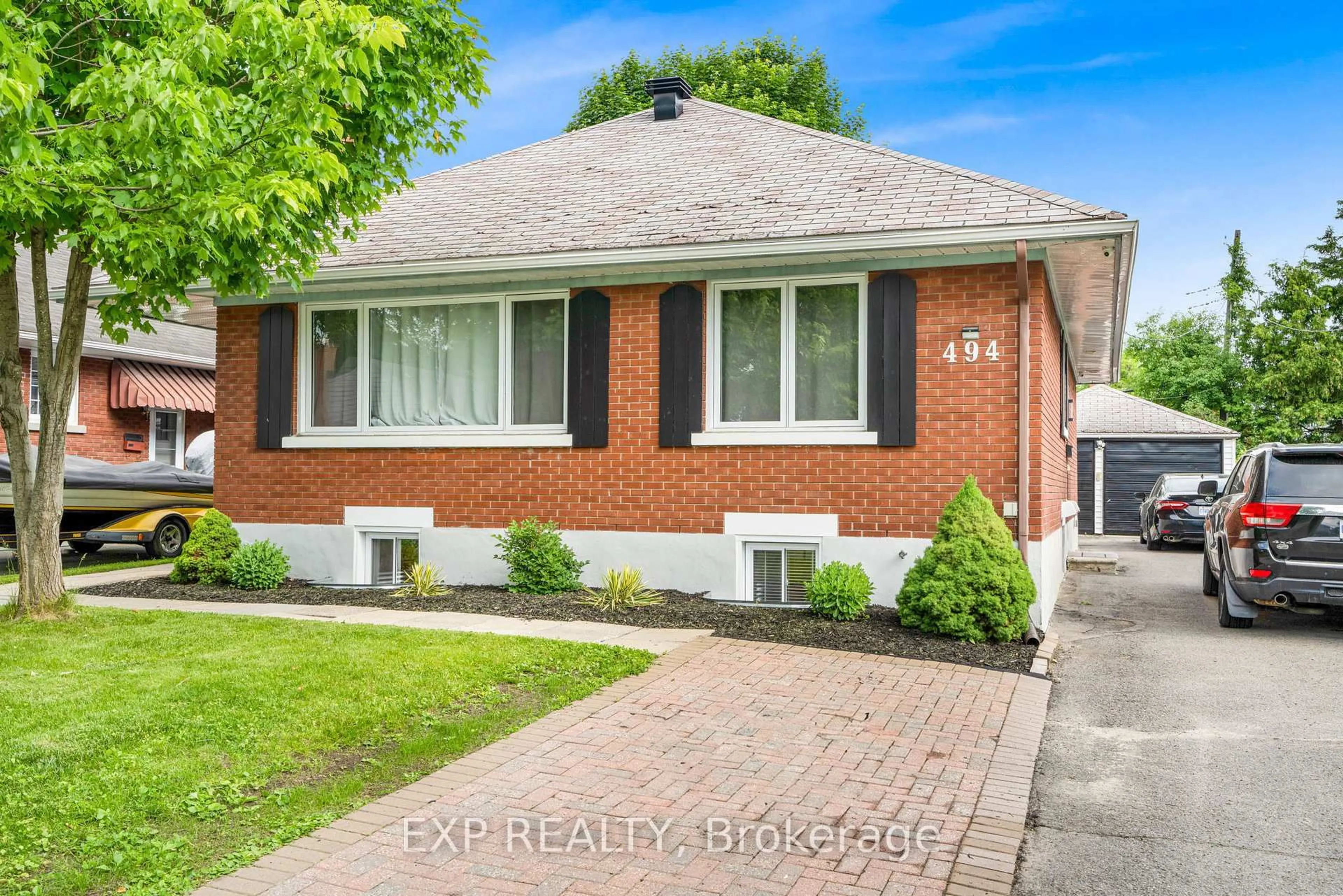 Home with brick exterior material, street for 494 Wolffdale Cres, Ottawa Ontario K1K 1N5