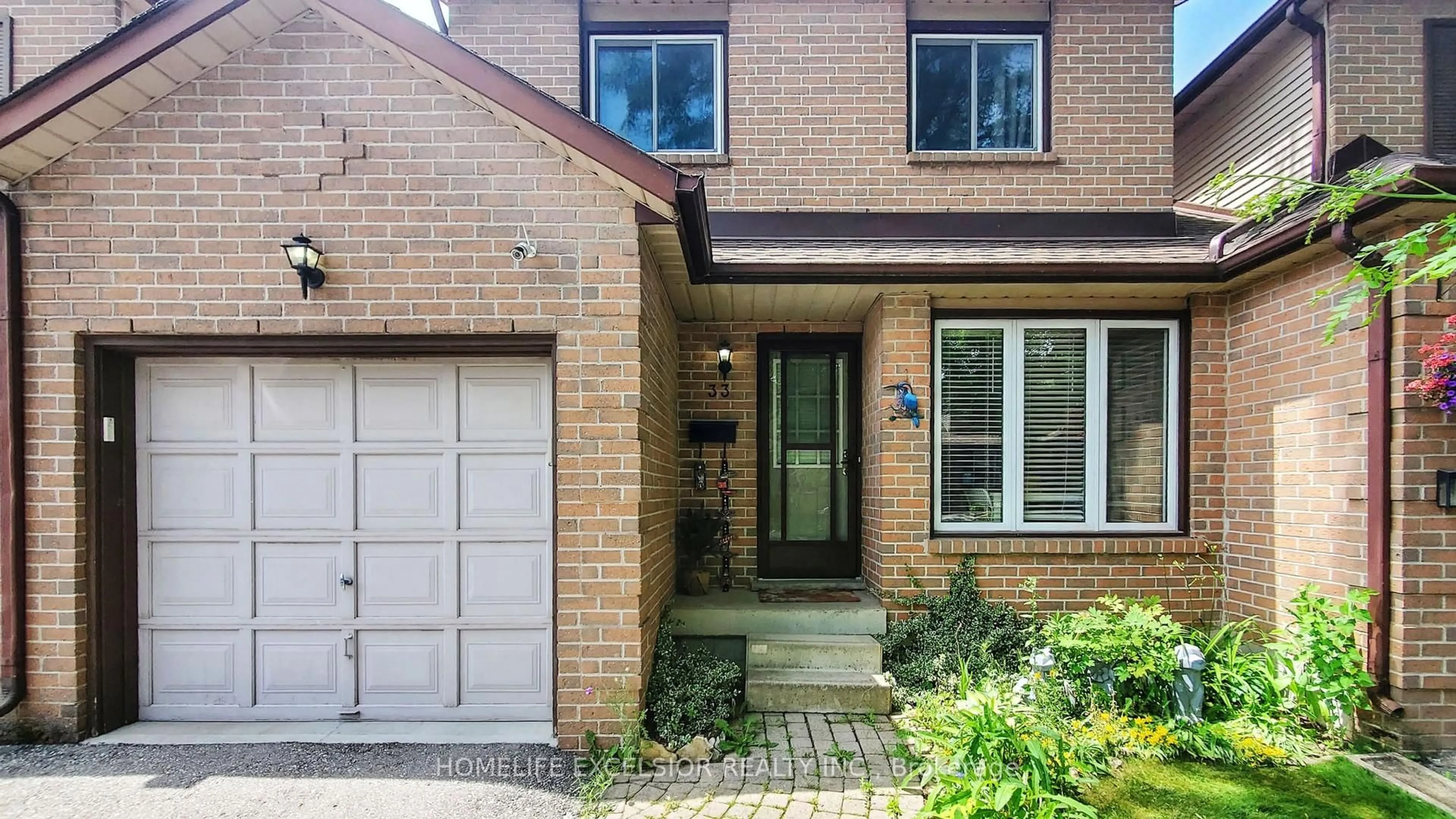 Home with brick exterior material, street for 618 Barton St #33, Hamilton Ontario L8E 4X3