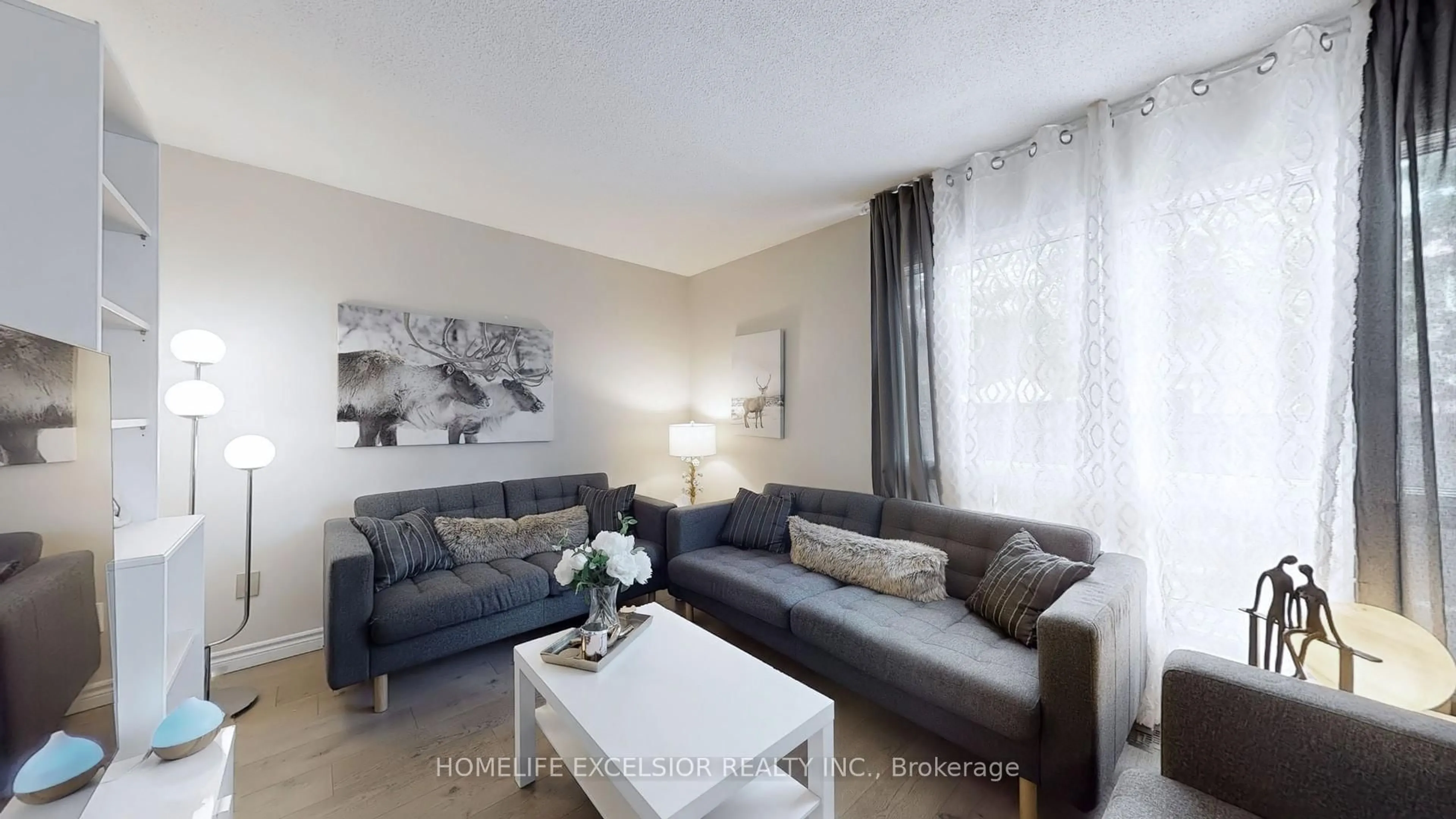 Living room with furniture, unknown for 618 Barton St #33, Hamilton Ontario L8E 4X3