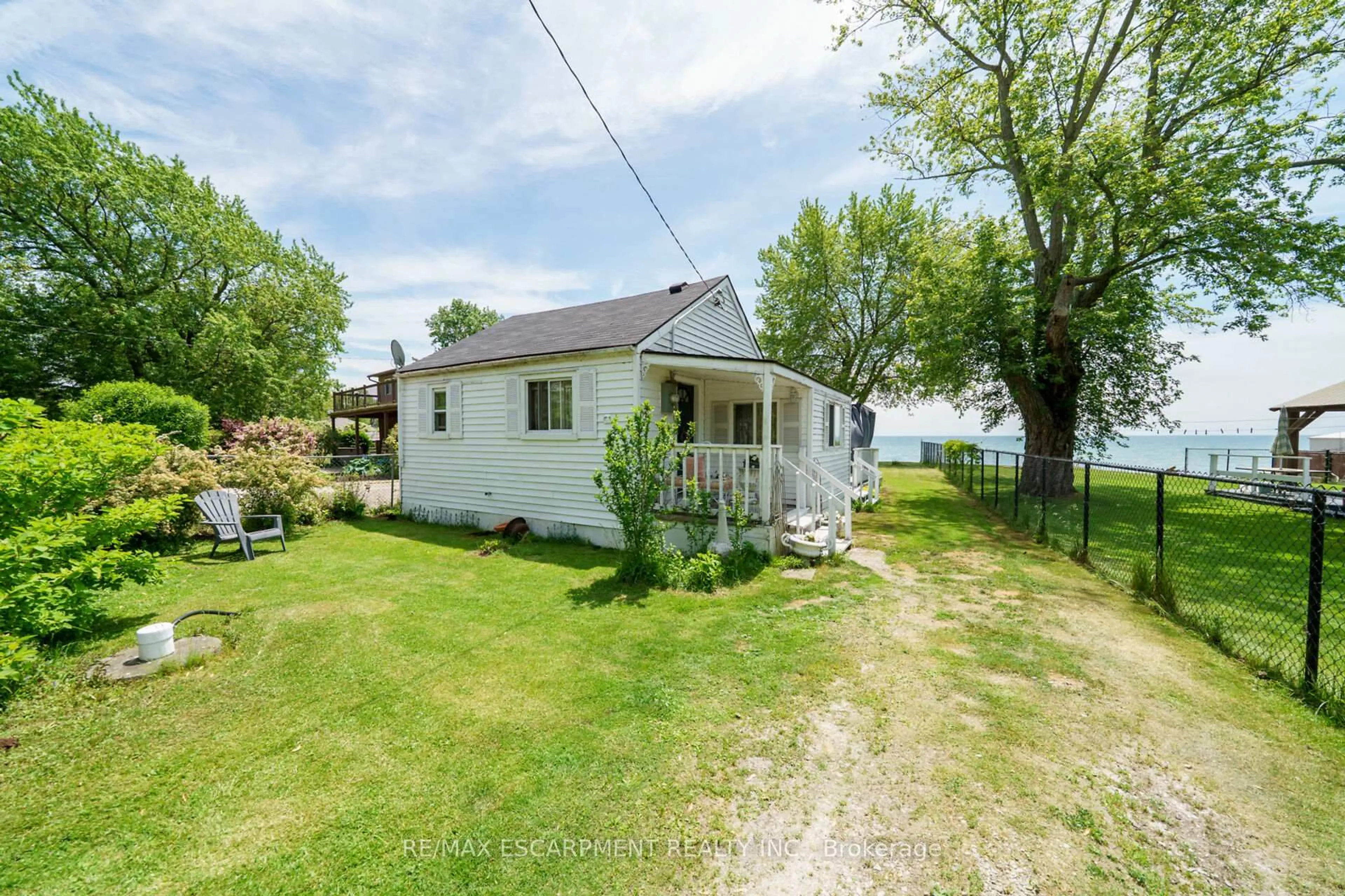 A pic from outside/outdoor area/front of a property/back of a property/a pic from drone, water/lake/river/ocean view for 976 Lakeshore Rd, Haldimand Ontario N0A 1P0
