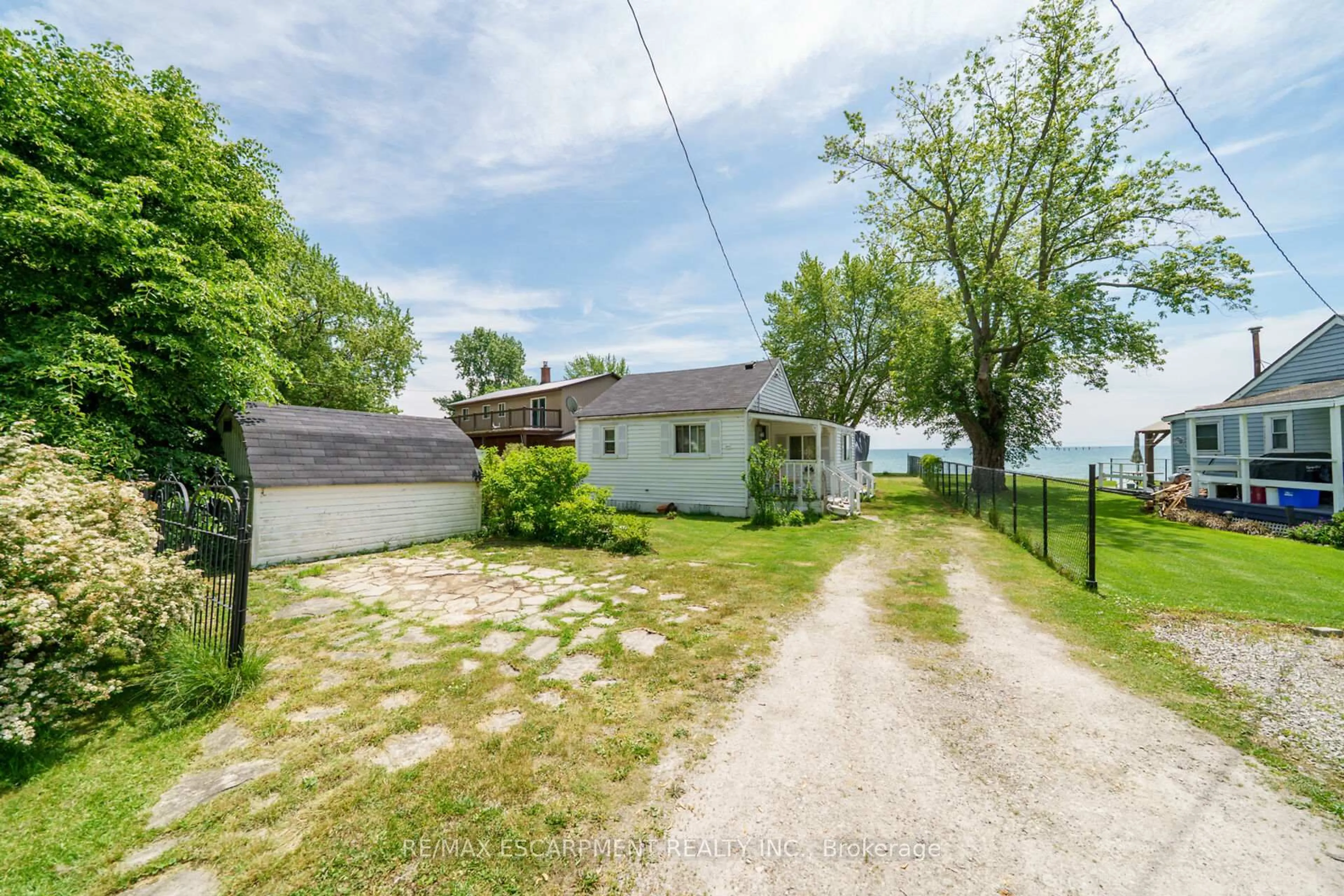A pic from outside/outdoor area/front of a property/back of a property/a pic from drone, water/lake/river/ocean view for 976 Lakeshore Rd, Haldimand Ontario N0A 1P0
