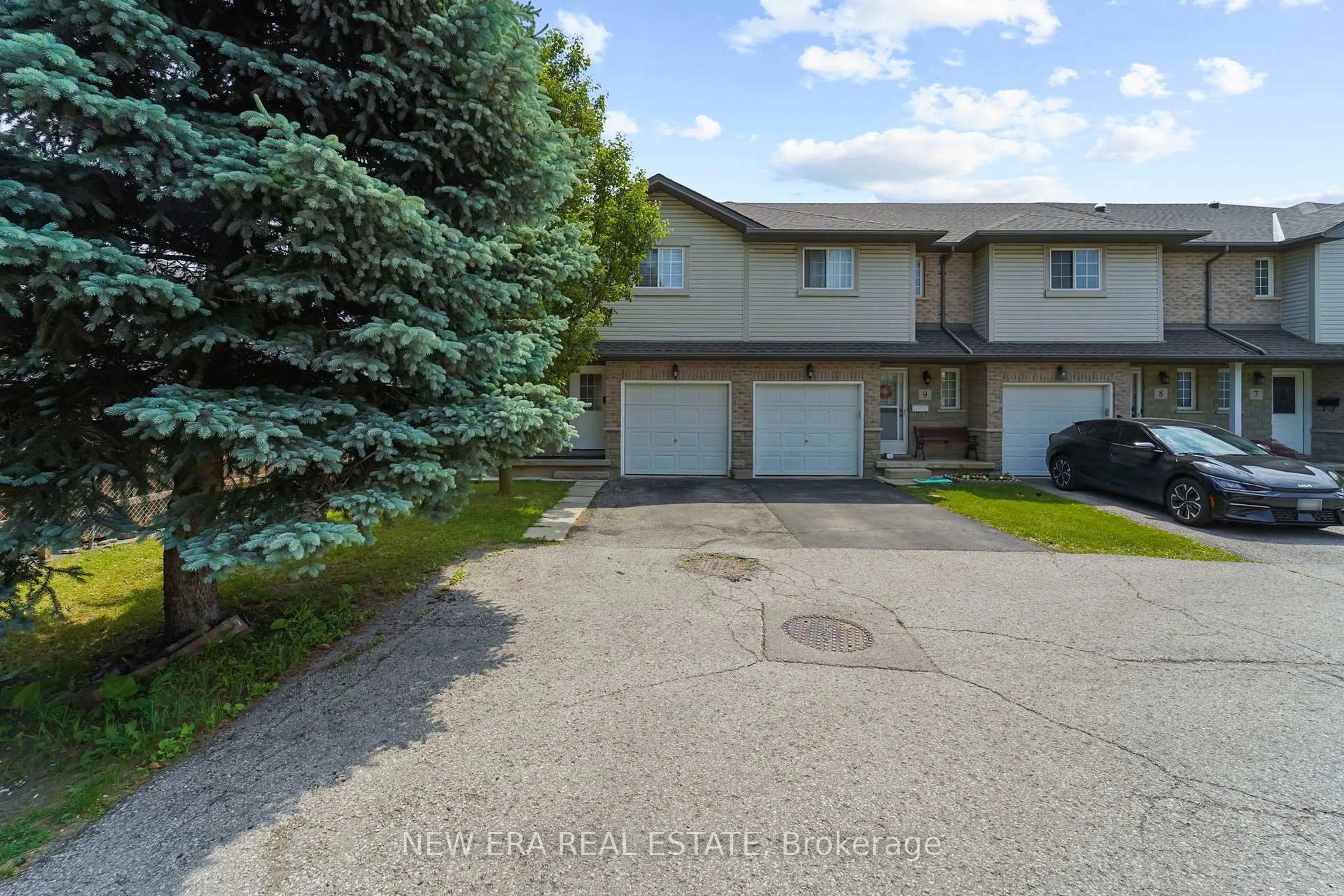 A pic from outside/outdoor area/front of a property/back of a property/a pic from drone, street for 1523 Upper Gage Ave #10, Hamilton Ontario L8W 1E6