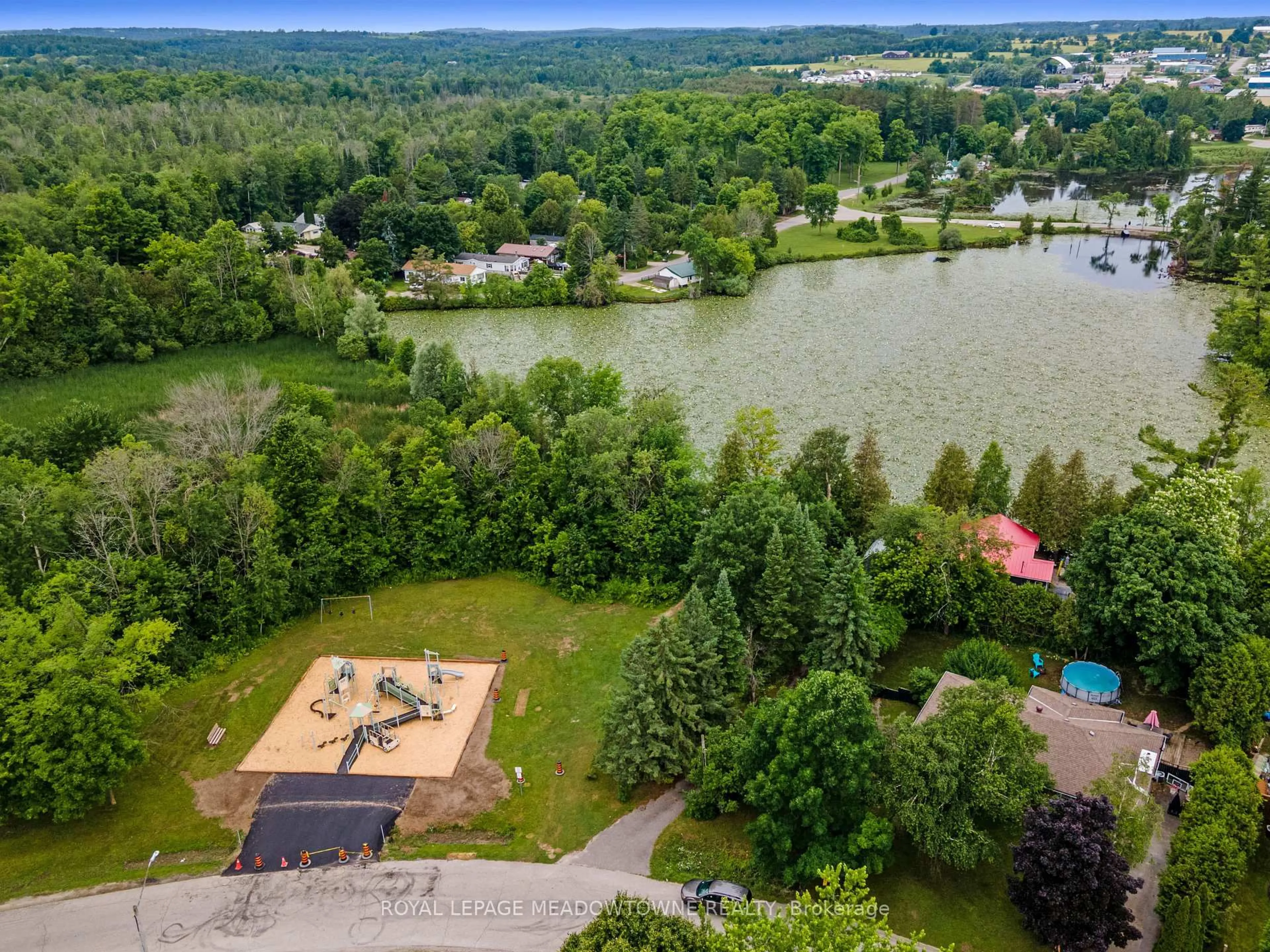 A pic from outside/outdoor area/front of a property/back of a property/a pic from drone, water/lake/river/ocean view for 16 Carberry St, Erin Ontario N0B 1T0