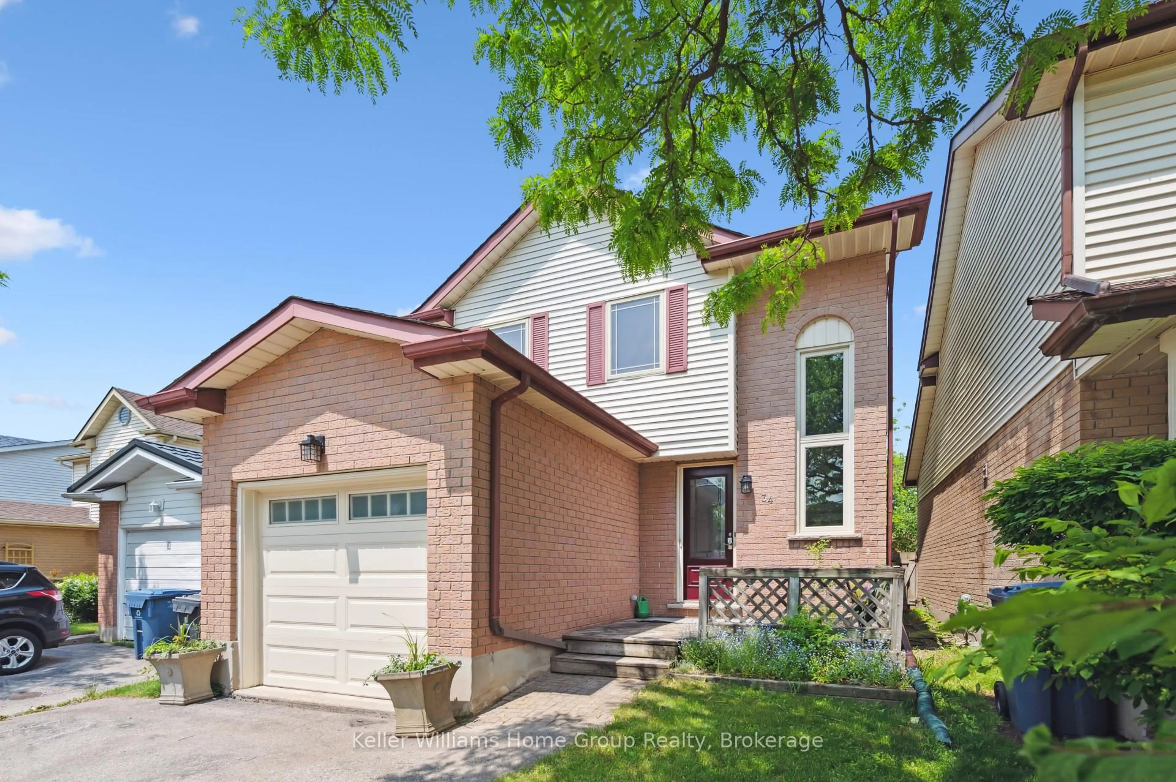 Home with brick exterior material, street for 34 Walman Dr, Guelph Ontario N1G 4G5