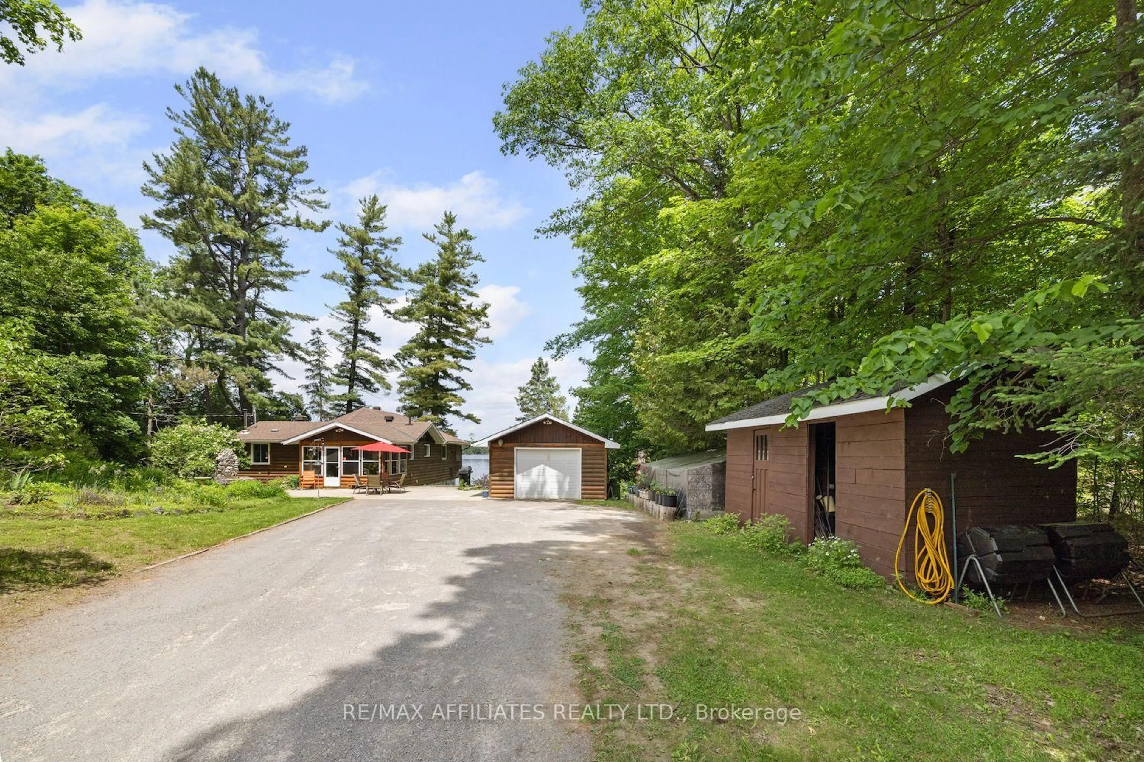 A pic from outside/outdoor area/front of a property/back of a property/a pic from drone, street for 1094 Snye Rd, White Lake Ontario K0A 3L0