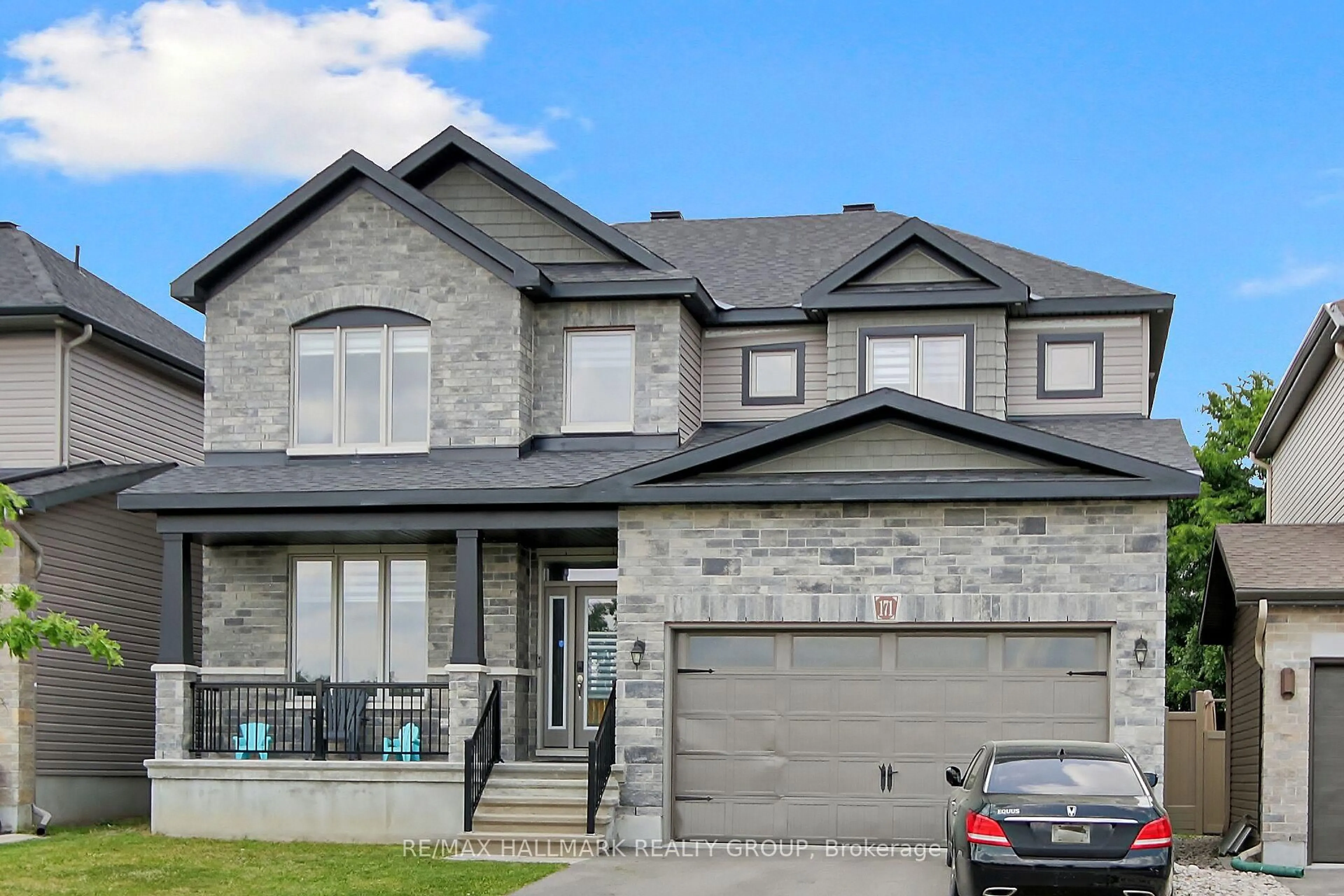 Home with brick exterior material, street for 171 Hickstead Way, Stittsville Ontario K2S 2B5