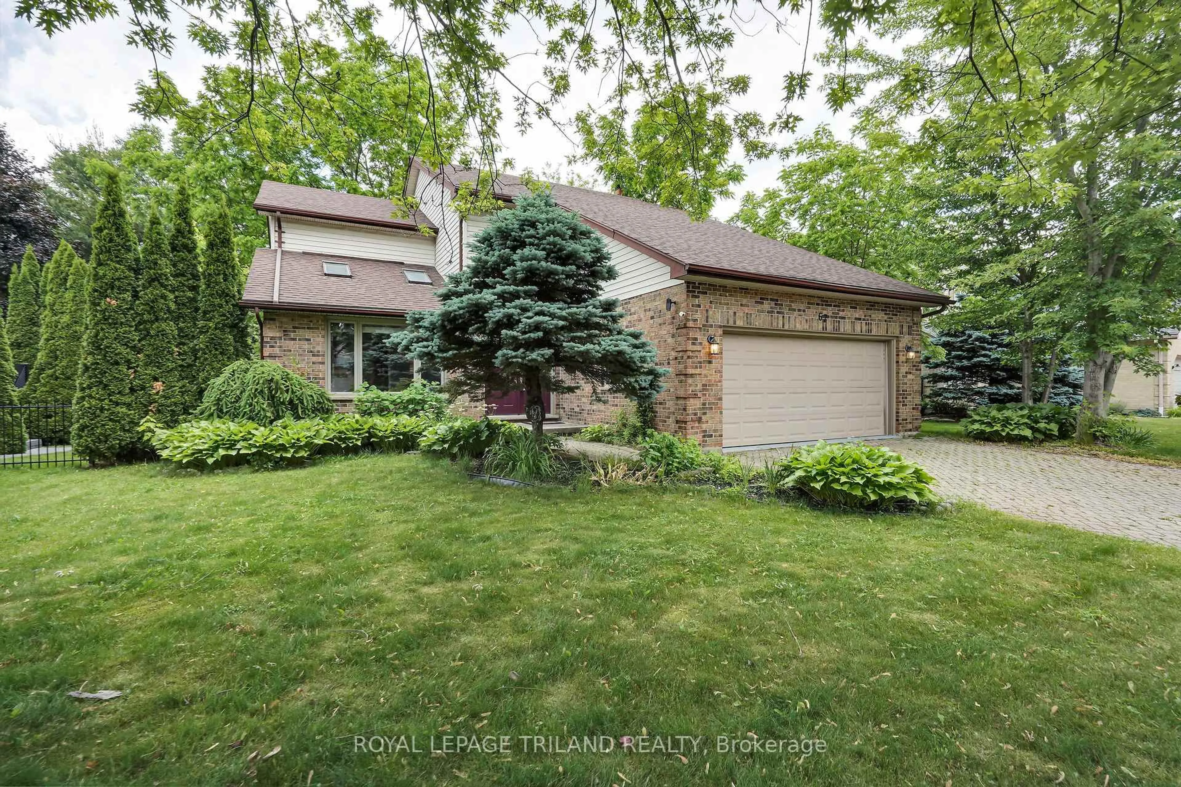 Home with brick exterior material, street for 67 Robinson Lane, London North Ontario N5X 3V4