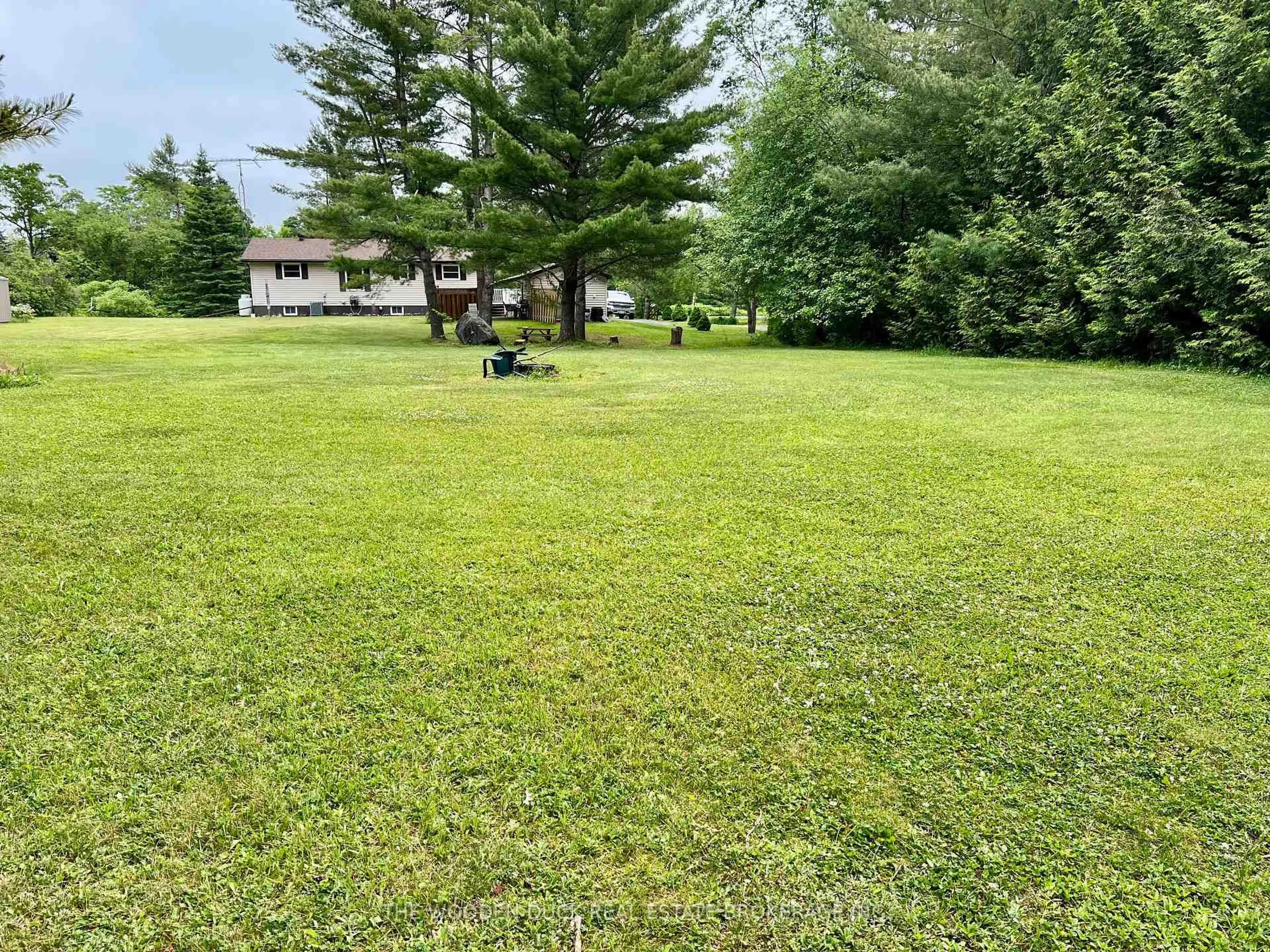 A pic from outside/outdoor area/front of a property/back of a property/a pic from drone, water/lake/river/ocean view for 1044 County 40 Rd, Douro-Dummer Ontario K0L 2V0