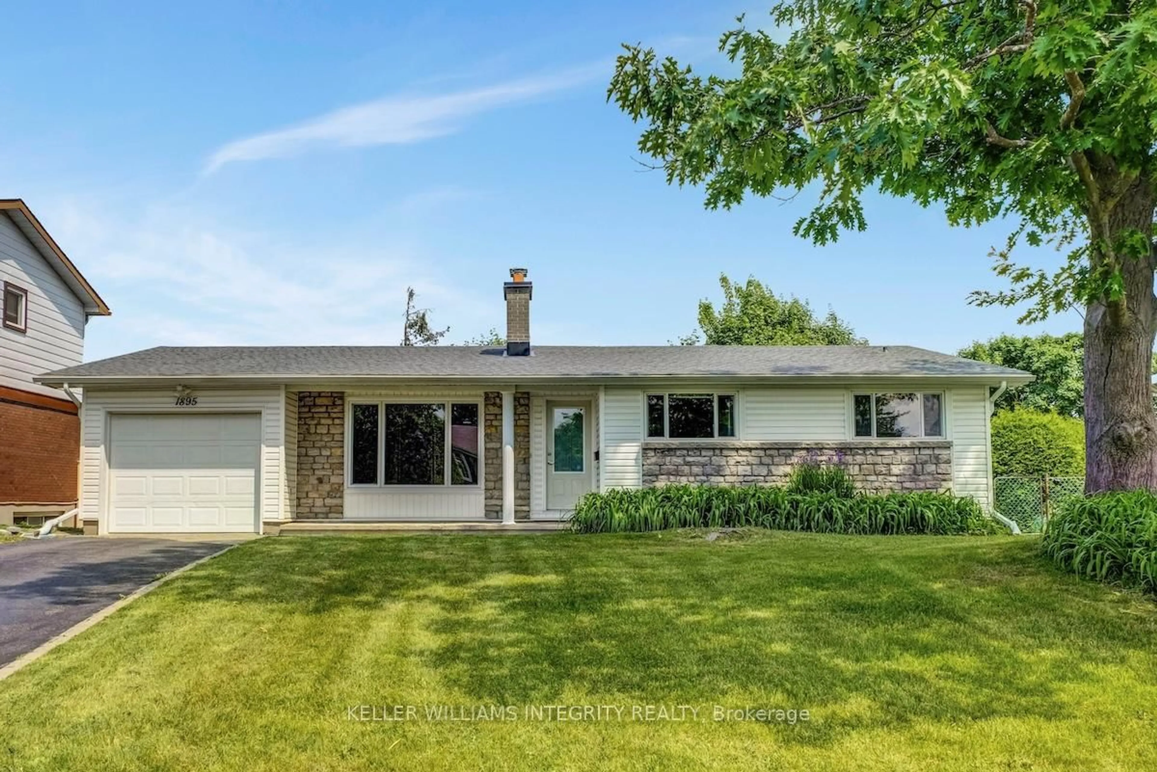 Home with vinyl exterior material, street for 1895 Greenacre Cres, Ottawa Ontario K1J 6S7