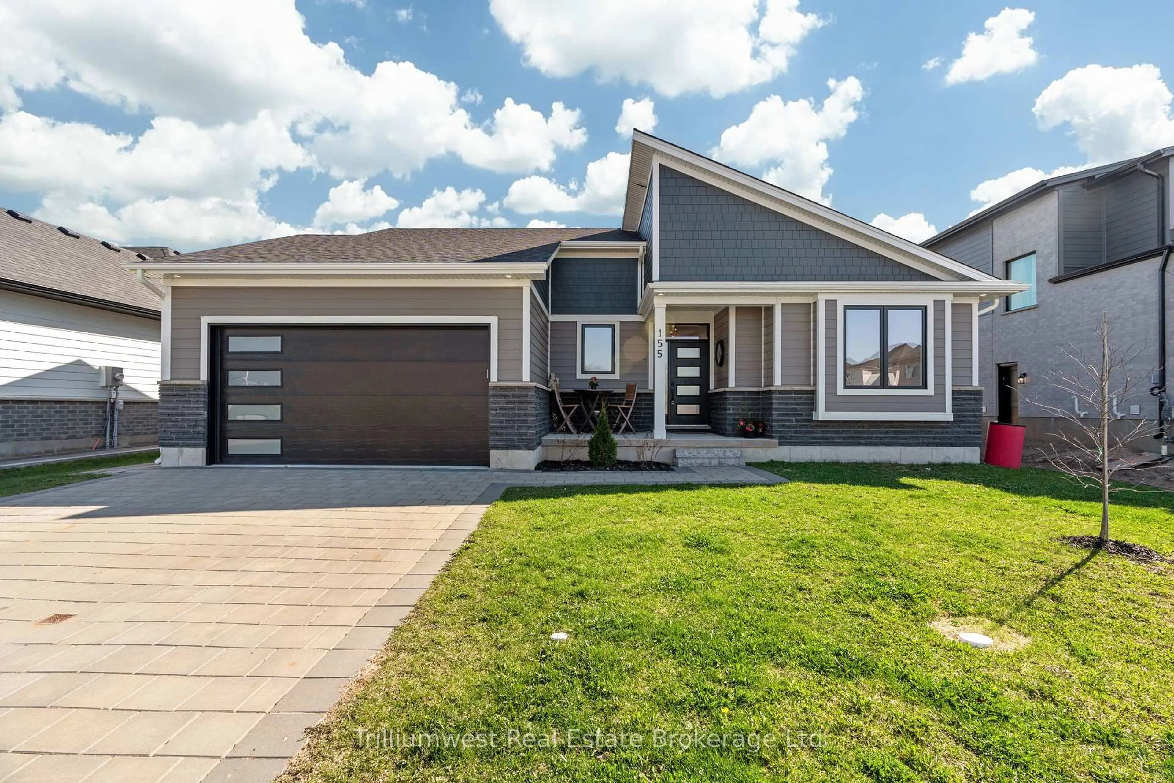 Home with vinyl exterior material, street for 155 Mcleod St, North Middlesex Ontario N0M 2K0