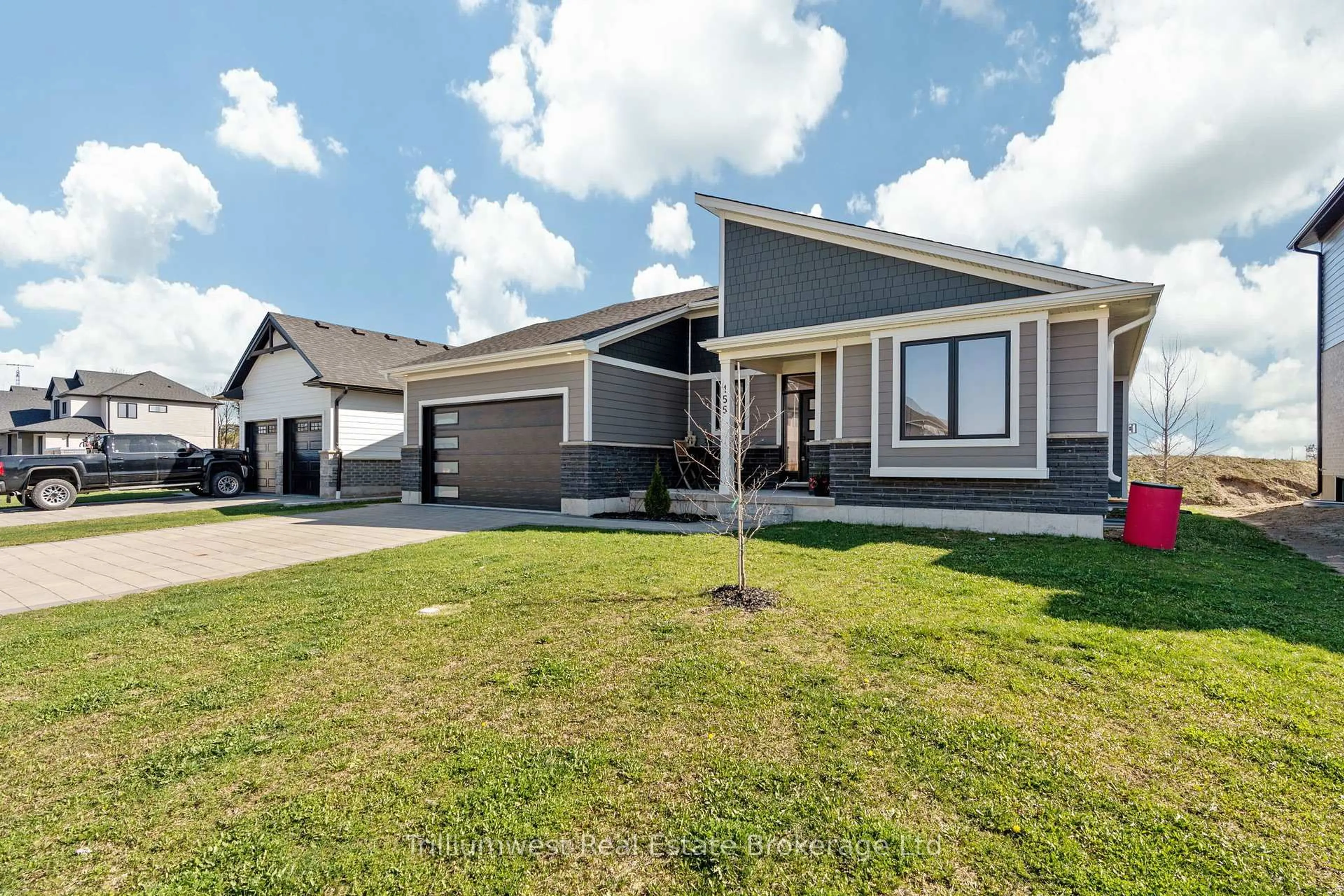 Home with vinyl exterior material, street for 155 Mcleod St, North Middlesex Ontario N0M 2K0