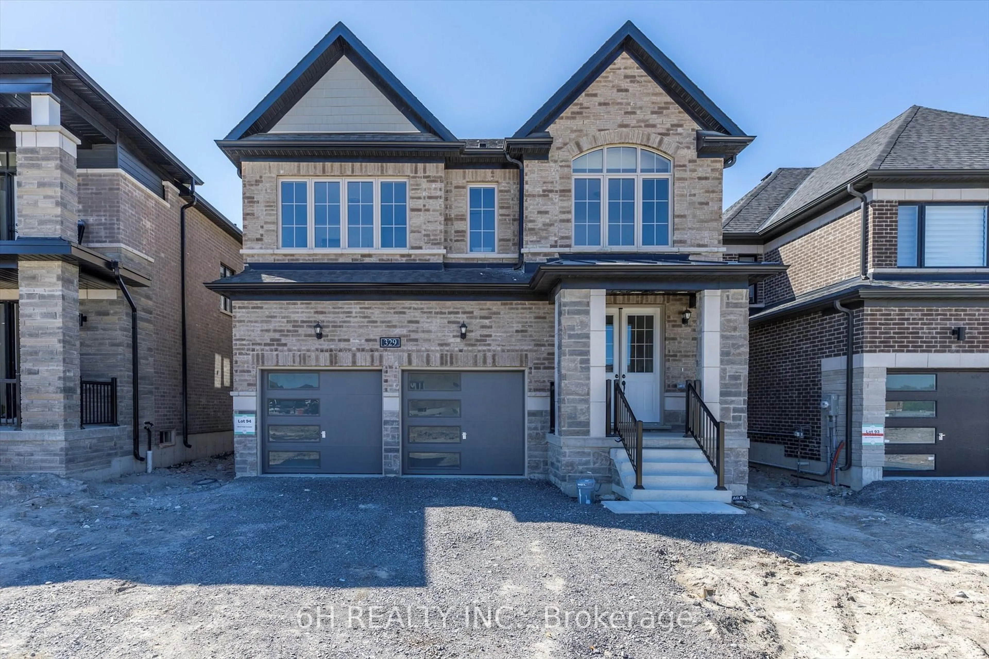 Home with brick exterior material, street for 329 O'Toole Cres, Selwyn Ontario K9K 0J4