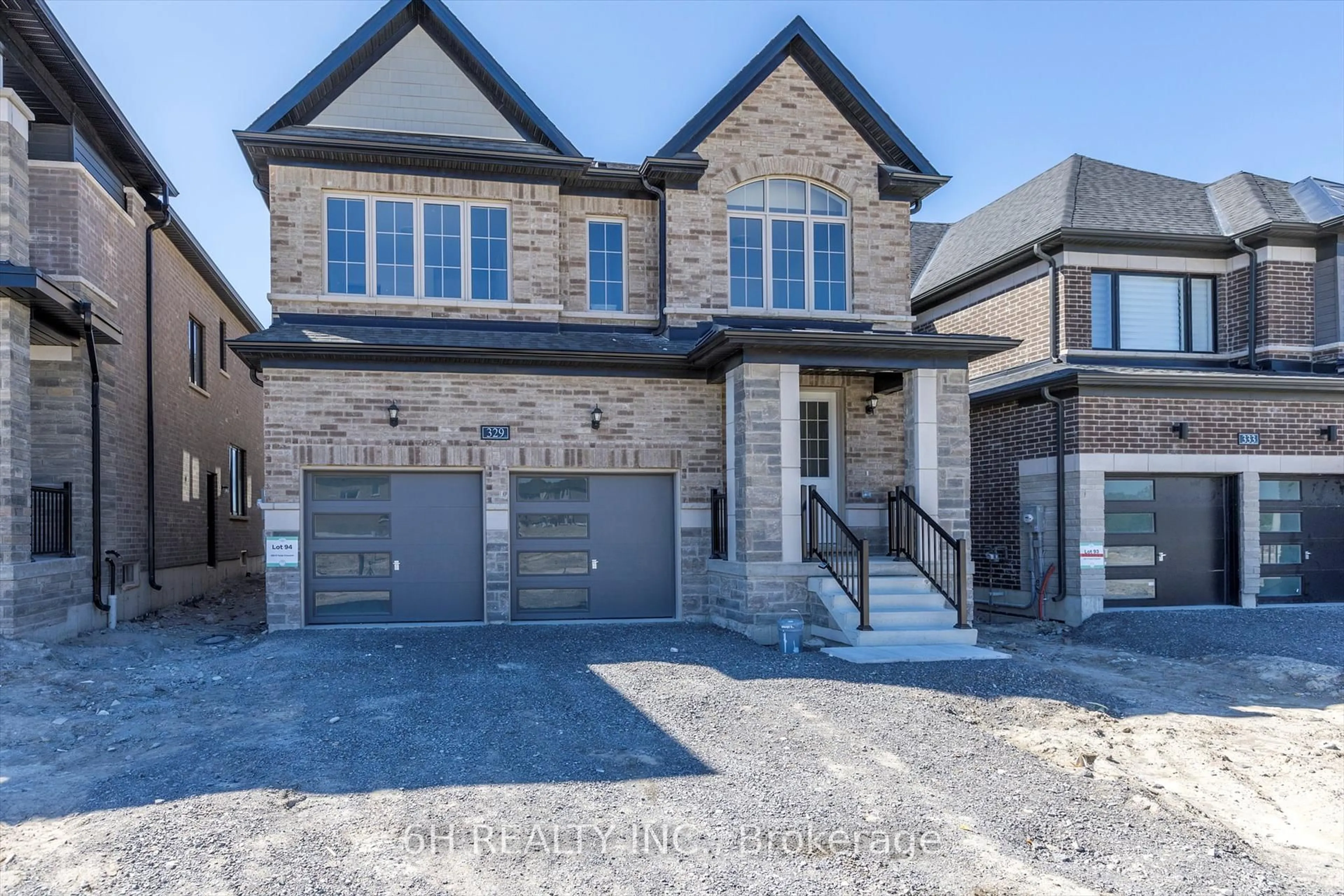 Home with brick exterior material, street for 329 O'Toole Cres, Selwyn Ontario K9K 0J4