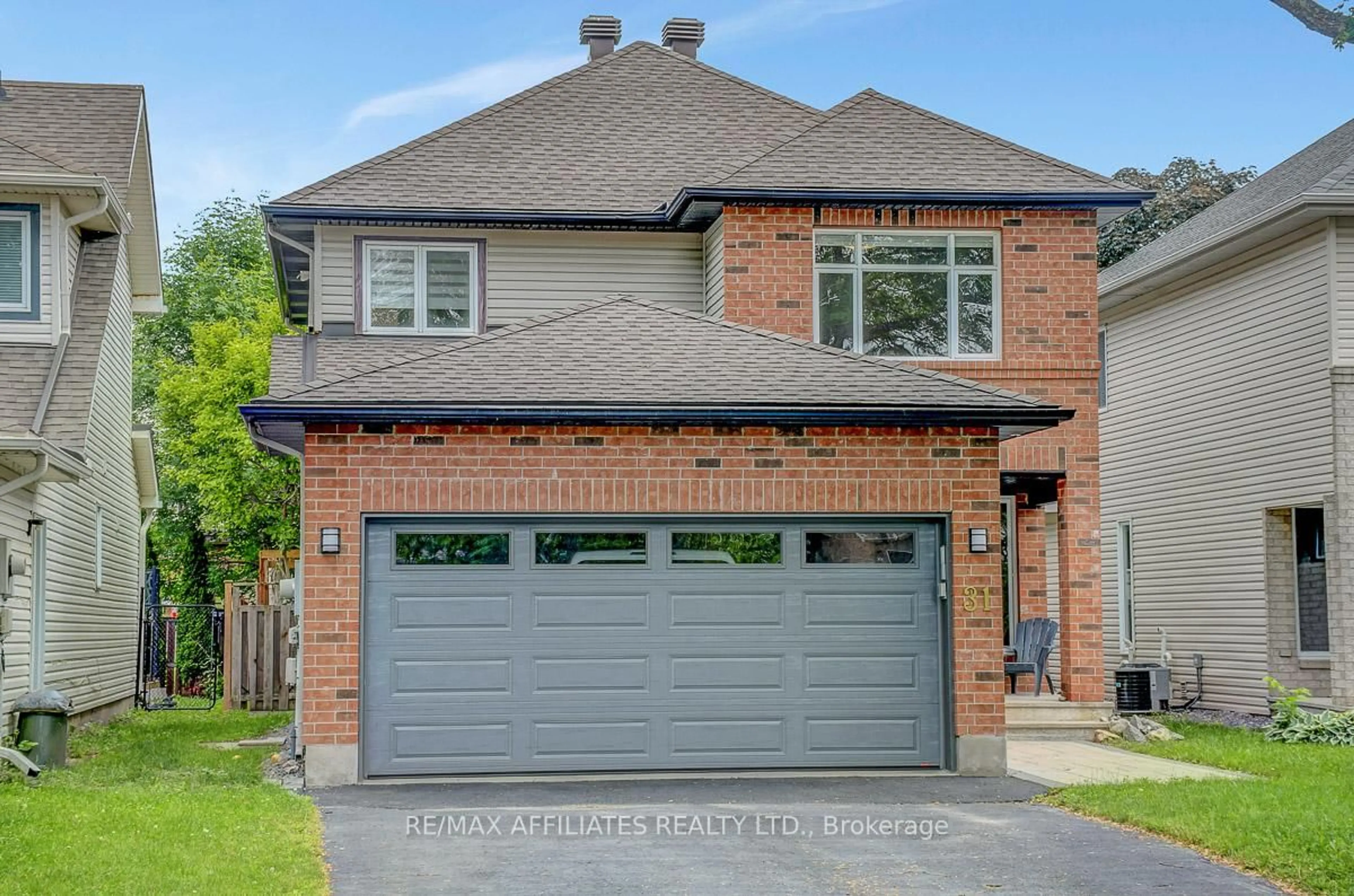 Home with brick exterior material, street for 31 Spur Ave, Ottawa Ontario K2M 2R9