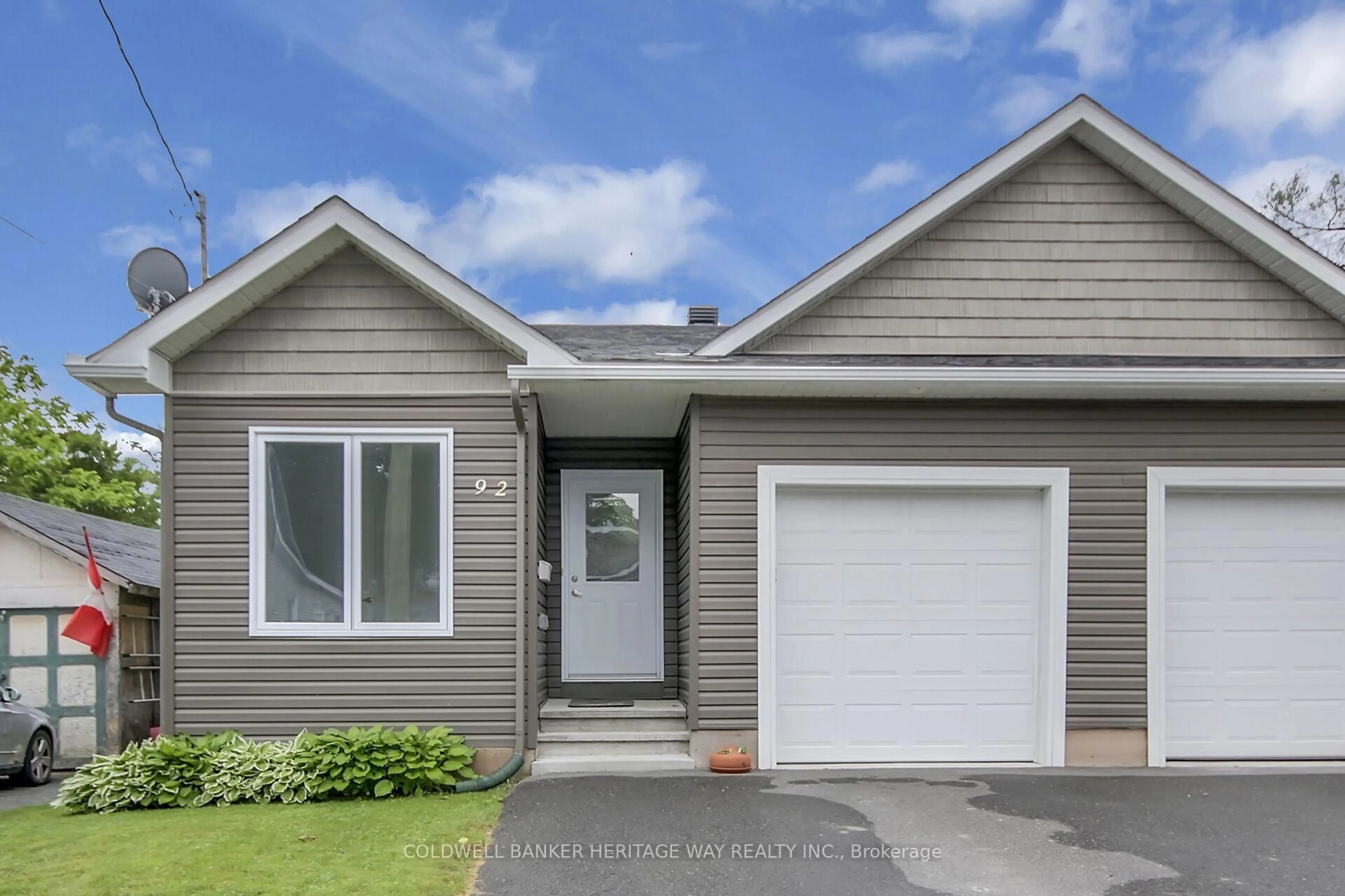 Home with vinyl exterior material, street for 92 Frank St, Carleton Place Ontario K7C 2Z8