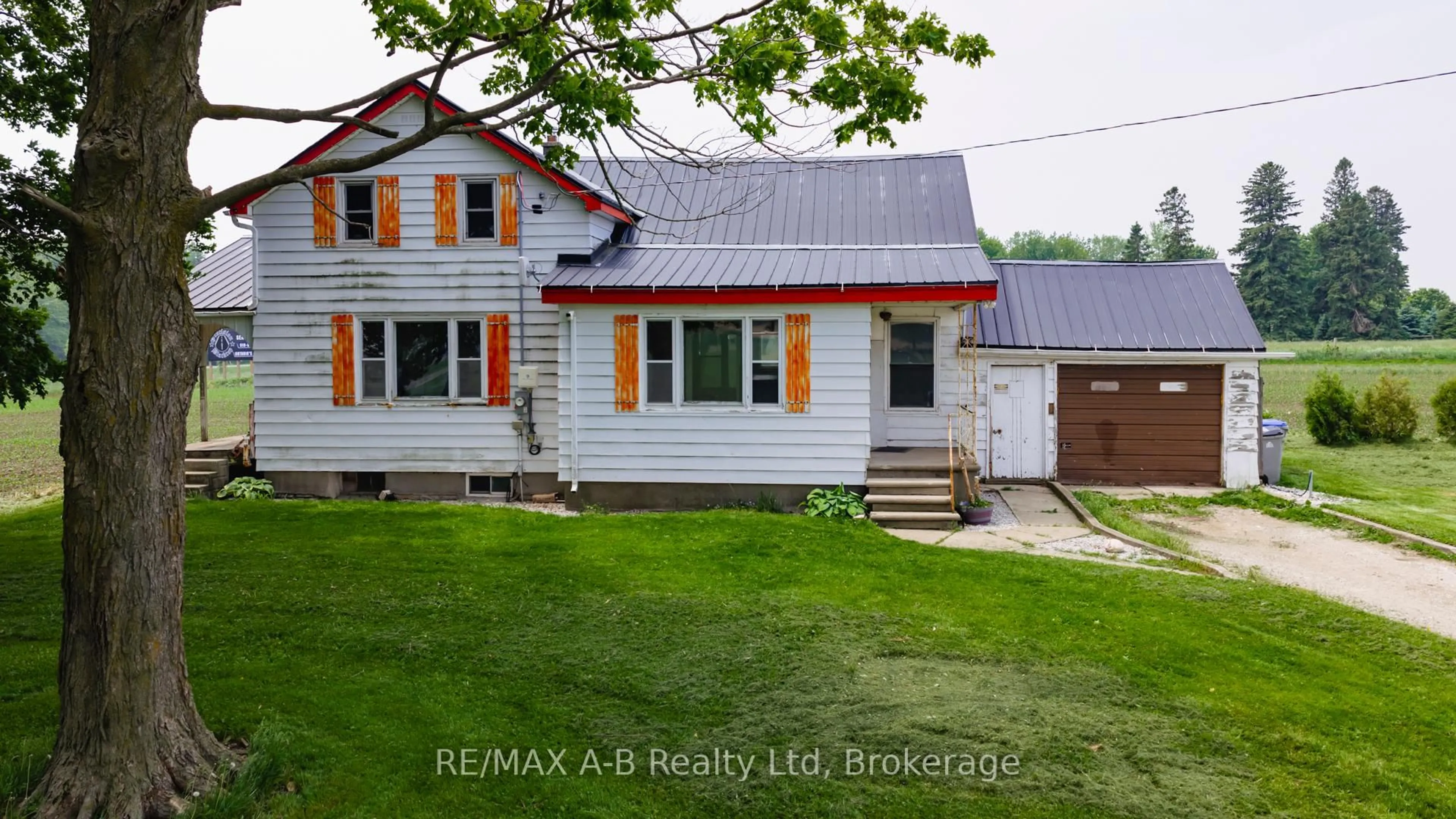A pic from outside/outdoor area/front of a property/back of a property/a pic from drone, street for 17570 Elginfield Rd, Perth South Ontario N4X 1C6