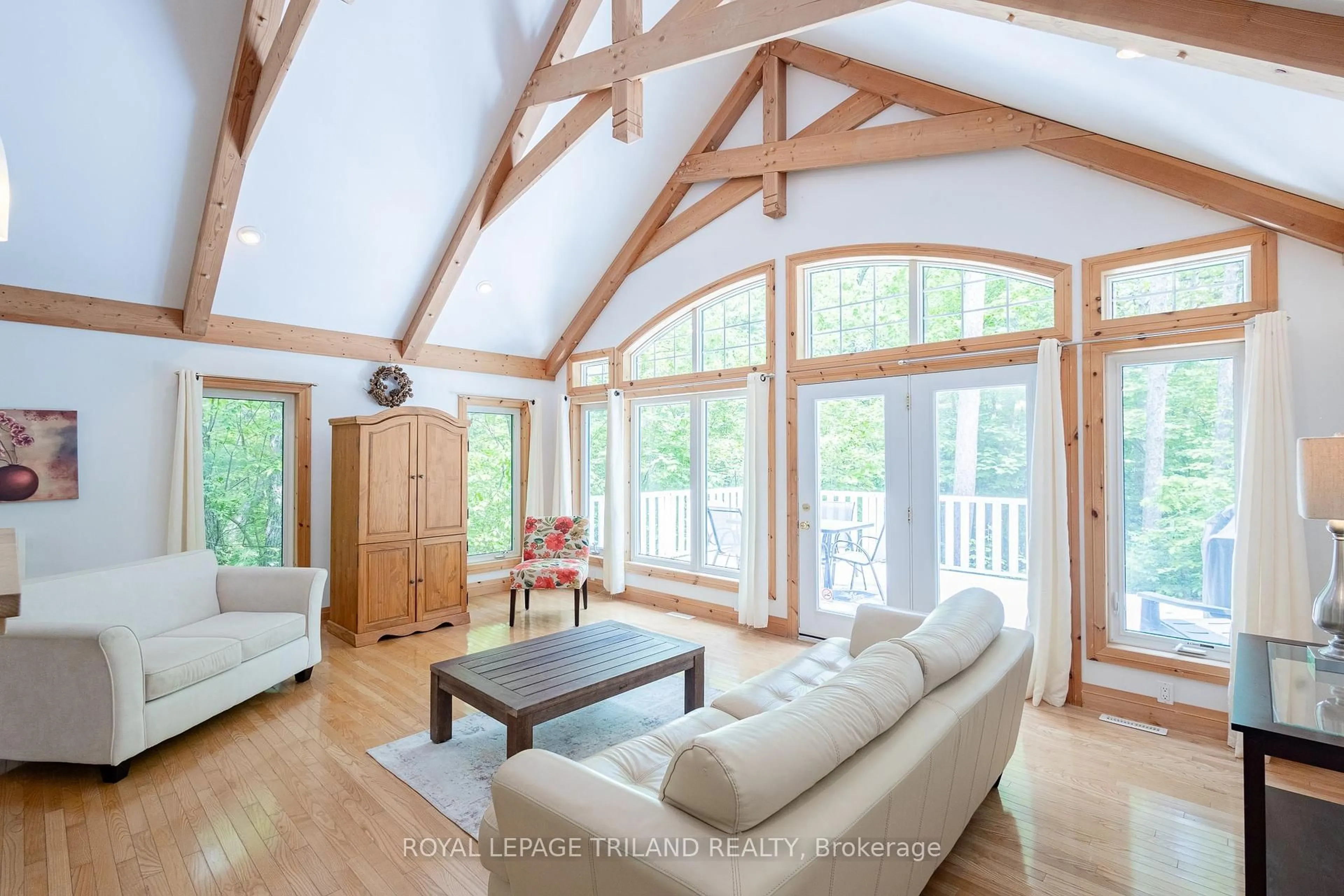 Living room with furniture, wood/laminate floor for 10059 Jennison Cres, Lambton Shores Ontario N0M 1T0