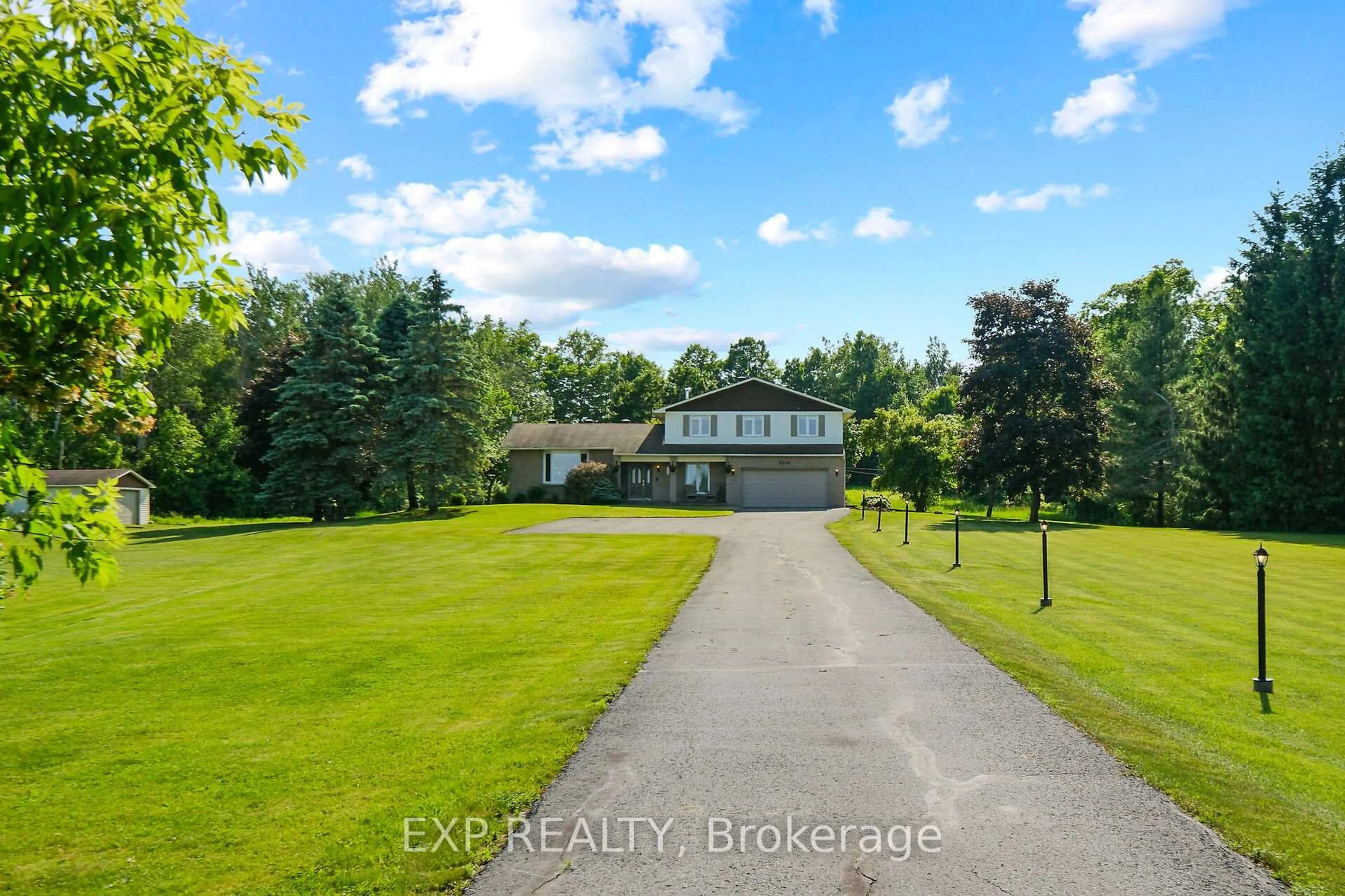 A pic from outside/outdoor area/front of a property/back of a property/a pic from drone, water/lake/river/ocean view for 1376 MacDonald Rd, Russell Ontario K4R 0K1