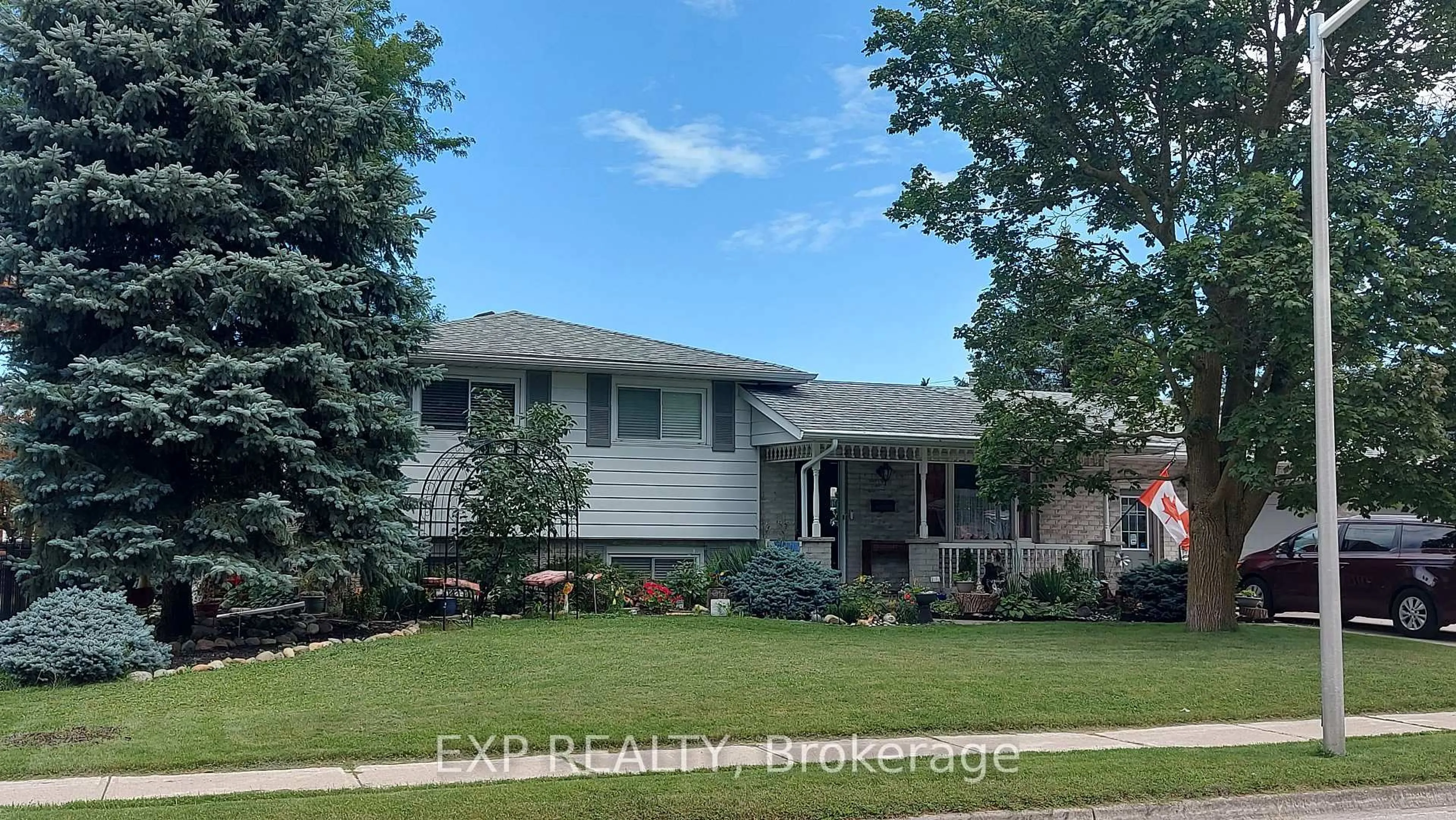 Home with vinyl exterior material, street for 96 Langford Dr, Lucan Biddulph Ontario N0M 2J0