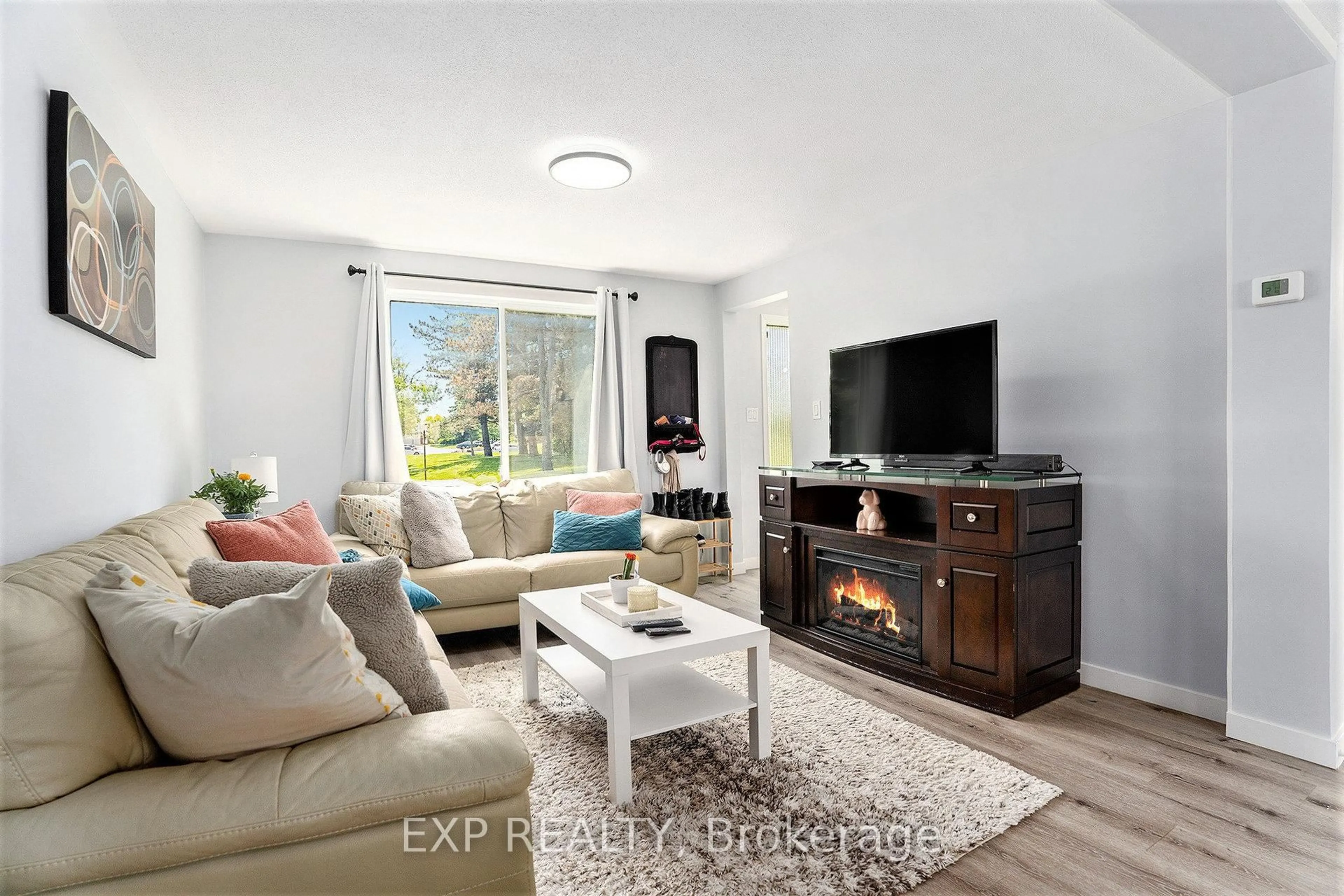 Living room with furniture, unknown for 1520 Beaverpond Dr #D, Ottawa Ontario K1B 3R9