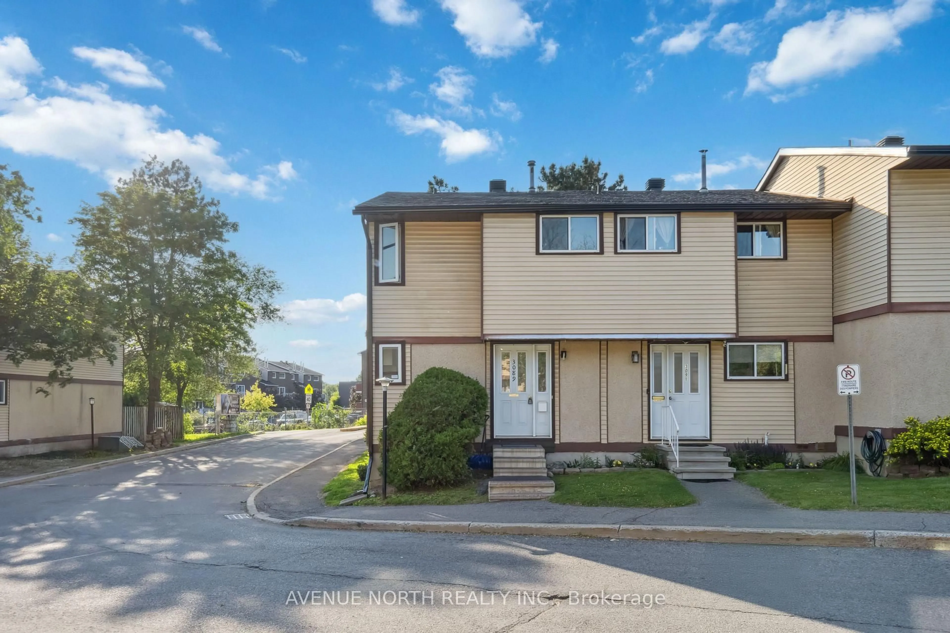 A pic from outside/outdoor area/front of a property/back of a property/a pic from drone, unknown for 3089 Quail Dr #7, Ottawa Ontario K1T 1T9