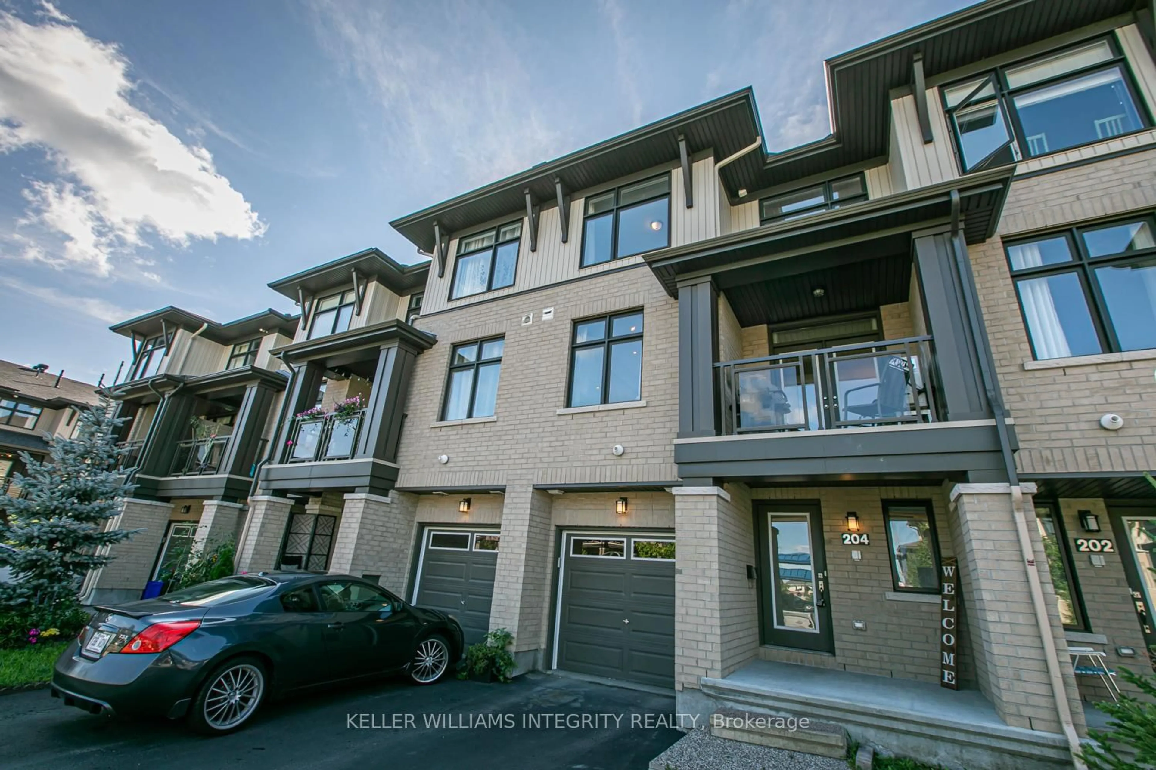 A pic from outside/outdoor area/front of a property/back of a property/a pic from drone, street for 204 Baltic Private, Ottawa Ontario K4M 0E2