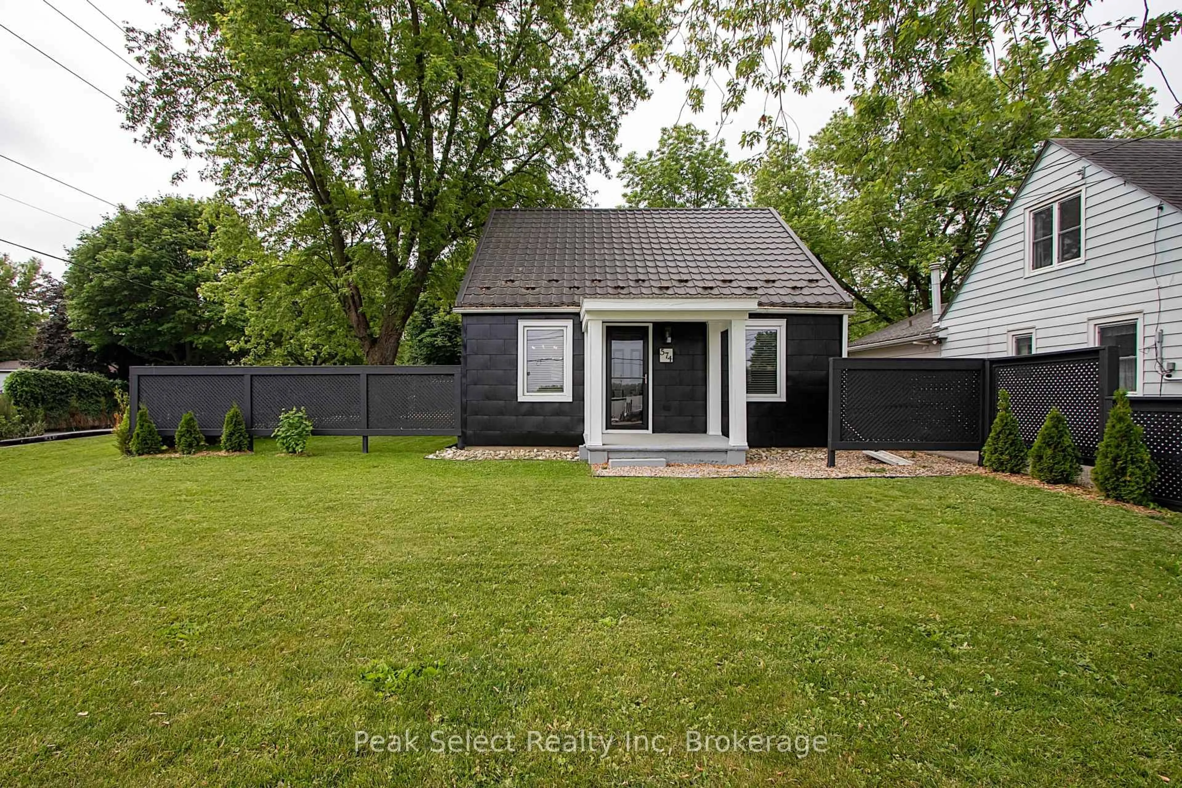 Home with vinyl exterior material, street for 574 Jones St, St. Marys Ontario N4X 1B3