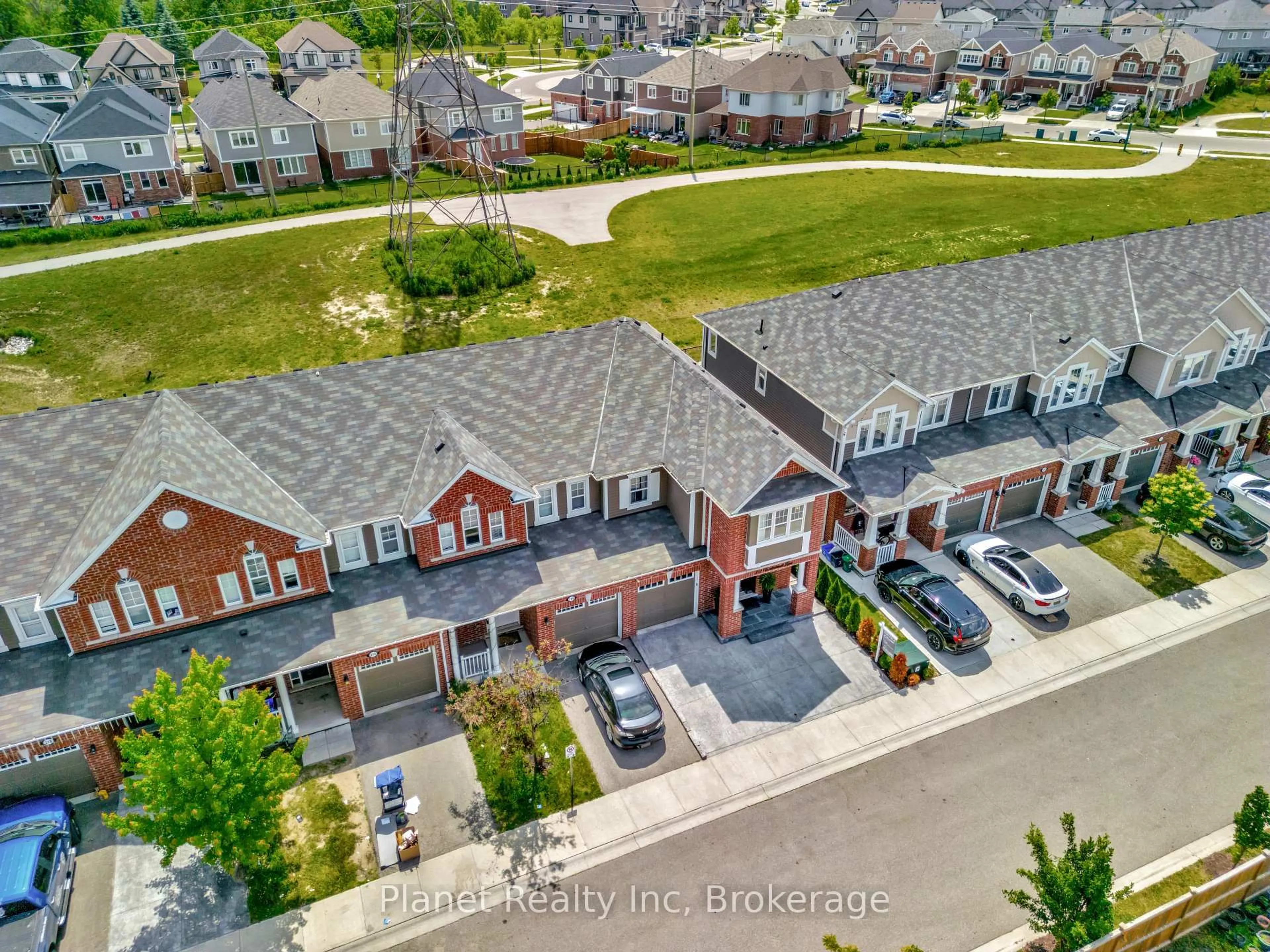 A pic from outside/outdoor area/front of a property/back of a property/a pic from drone, unknown for 212 Waterbrook Lane, Kitchener Ontario N2P 0H7
