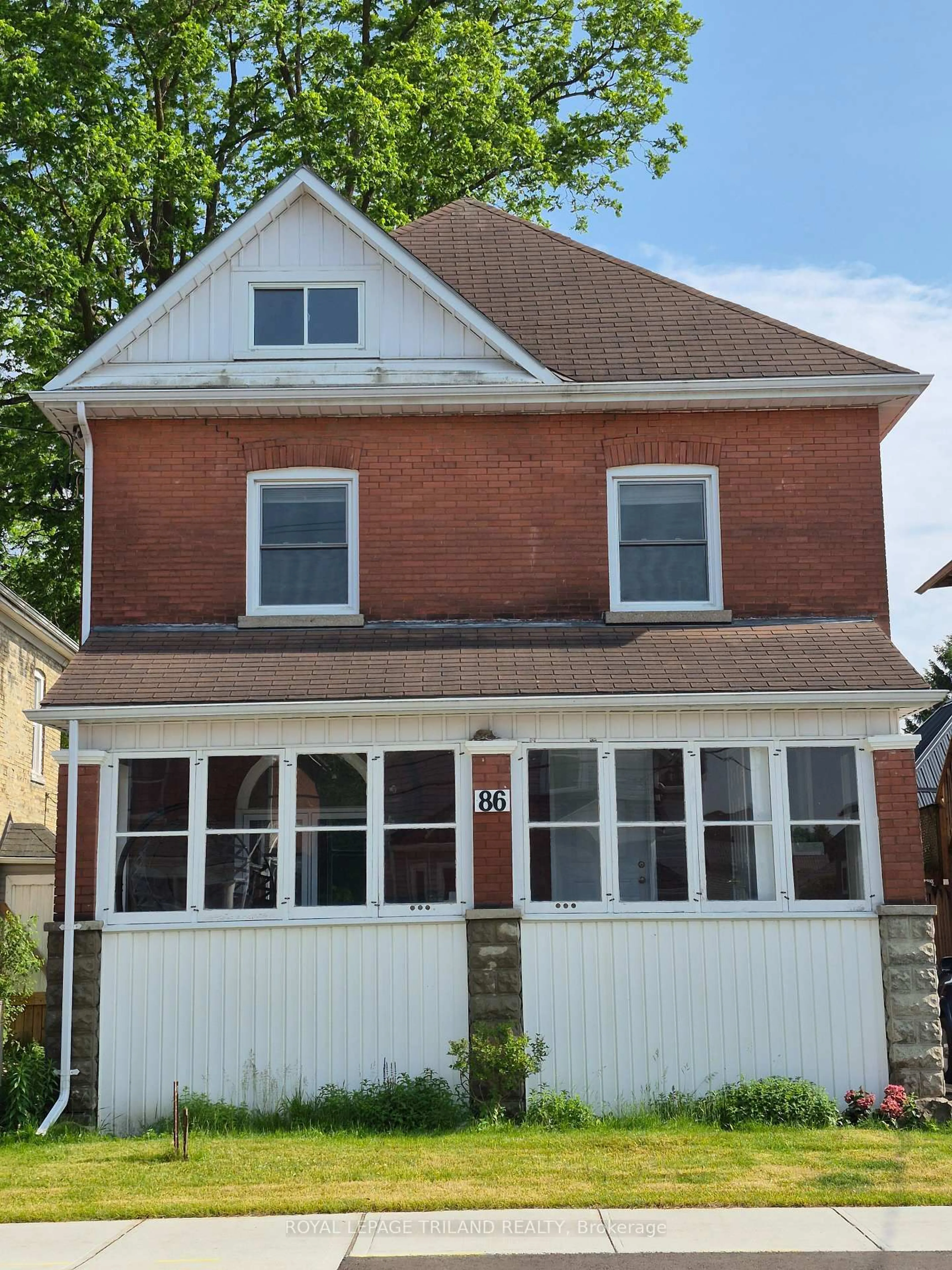 Home with brick exterior material, street for 86 Kains St, St. Thomas Ontario N5P 1N7