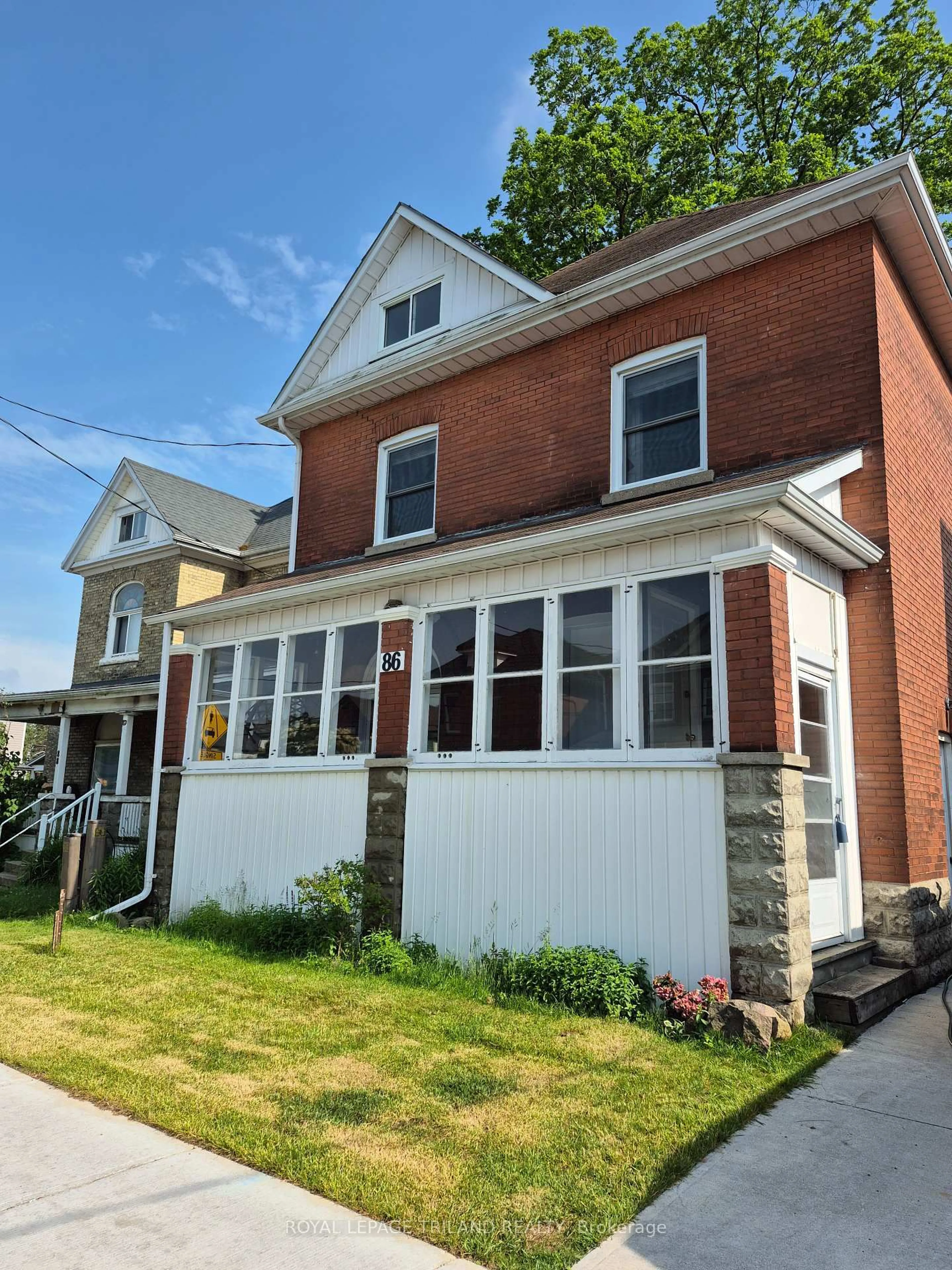 Home with brick exterior material, street for 86 Kains St, St. Thomas Ontario N5P 1N7