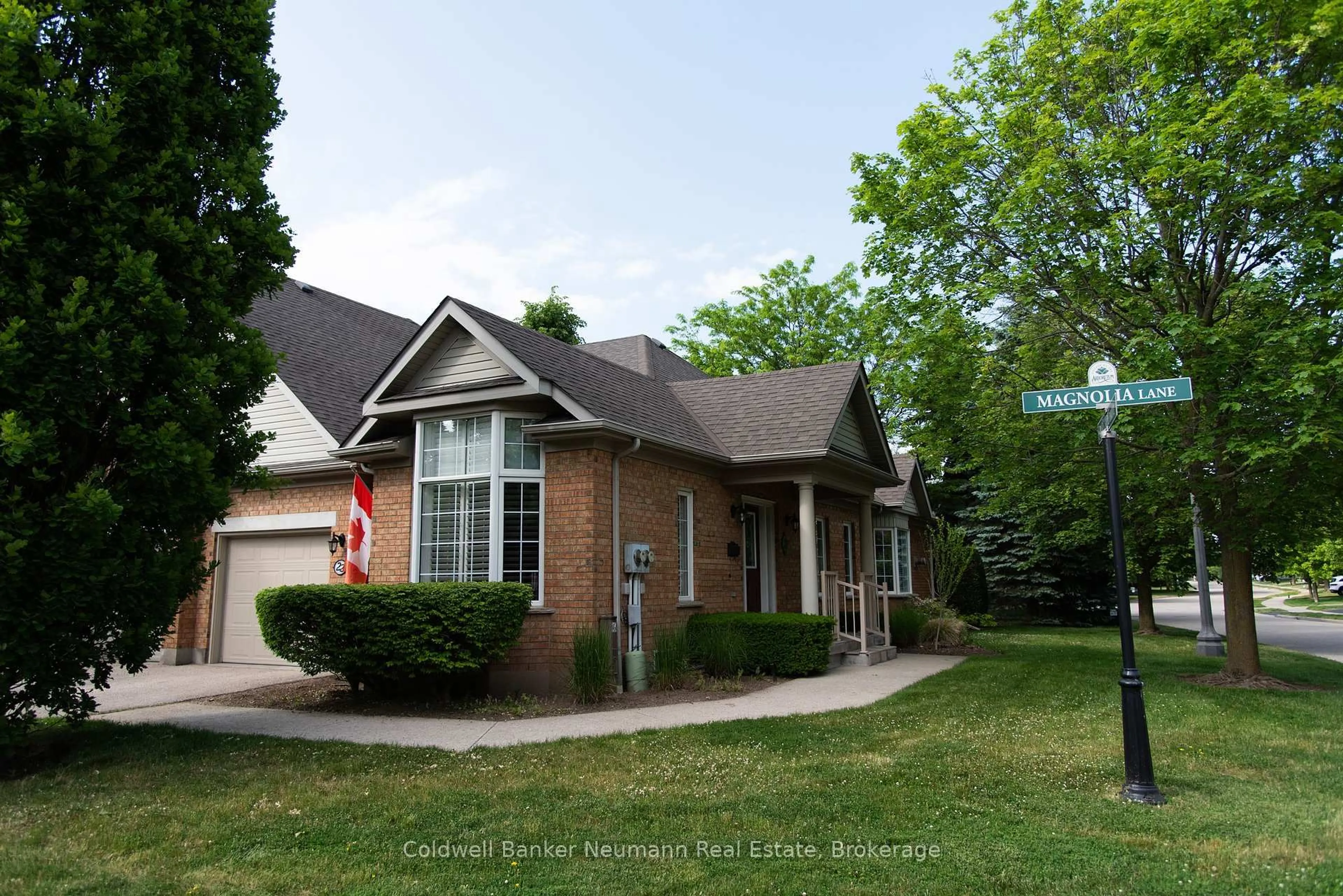 Home with brick exterior material, street for 22 Magnolia Lane, Guelph Ontario N1G 4X7