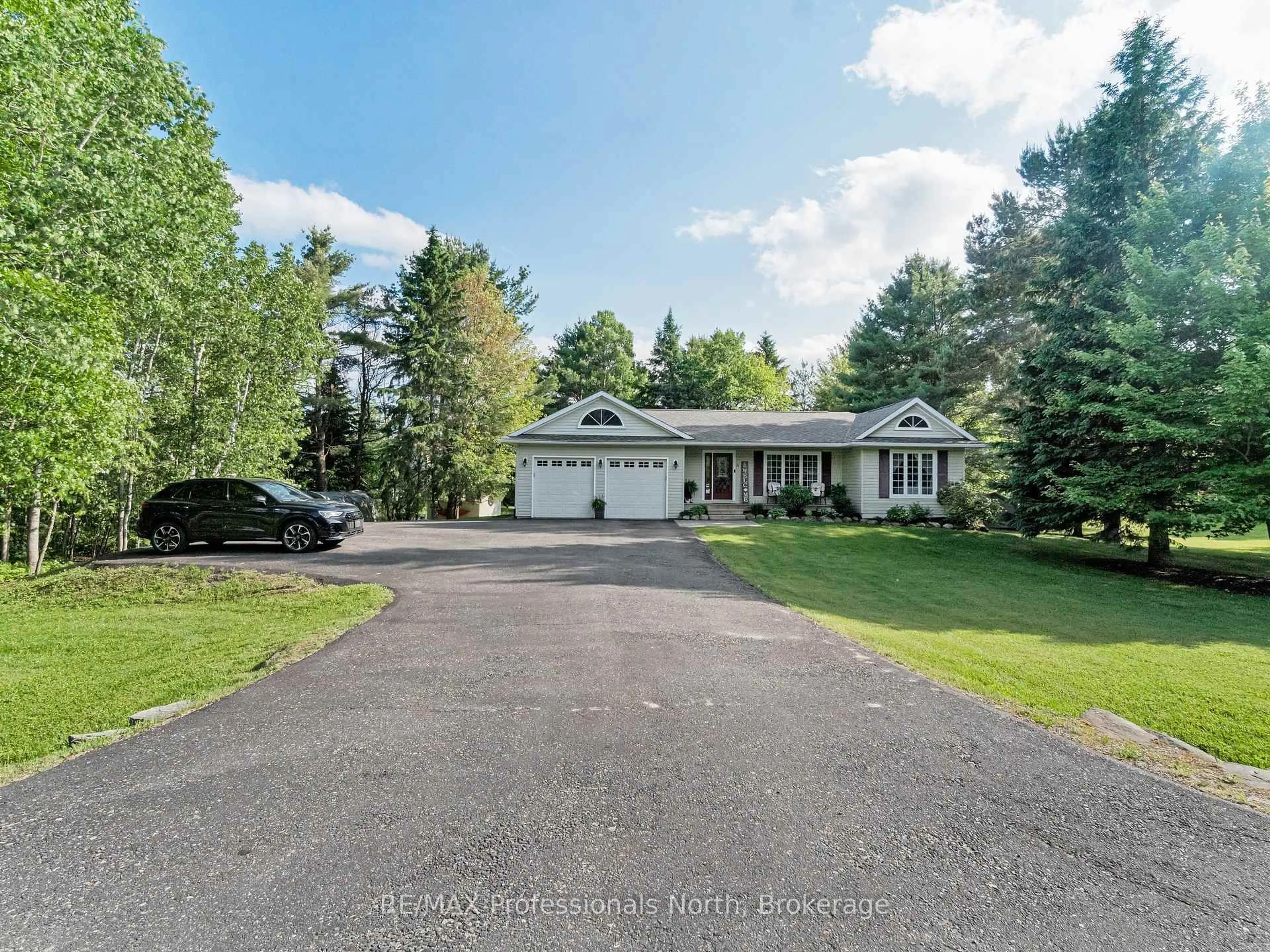 A pic from outside/outdoor area/front of a property/back of a property/a pic from drone, unknown for 11 Renwick Dr, Huntsville Ontario P1H 2M3