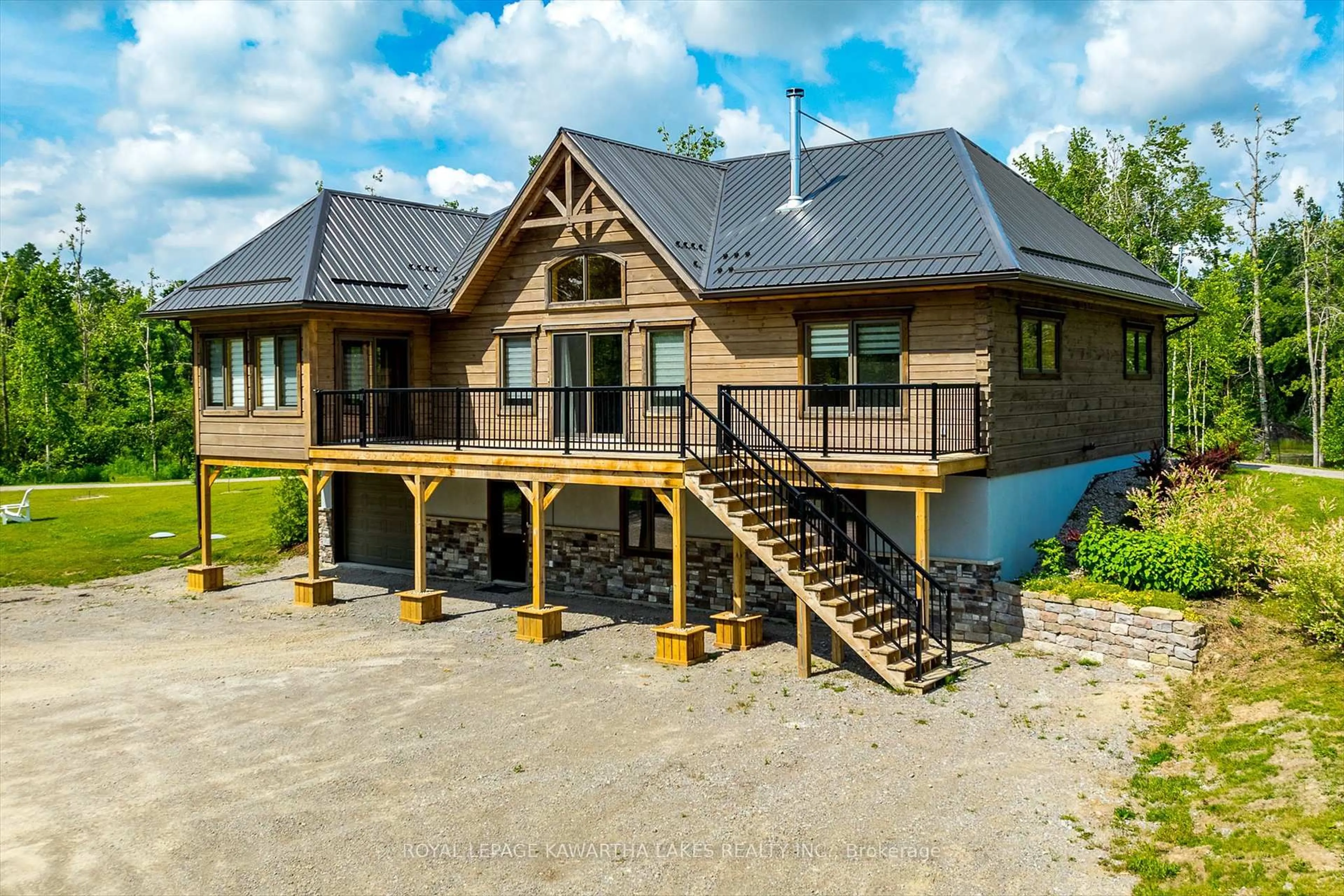 A pic from outside/outdoor area/front of a property/back of a property/a pic from drone, building for 563 Heights Rd, Kawartha Lakes Ontario K0L 2X0