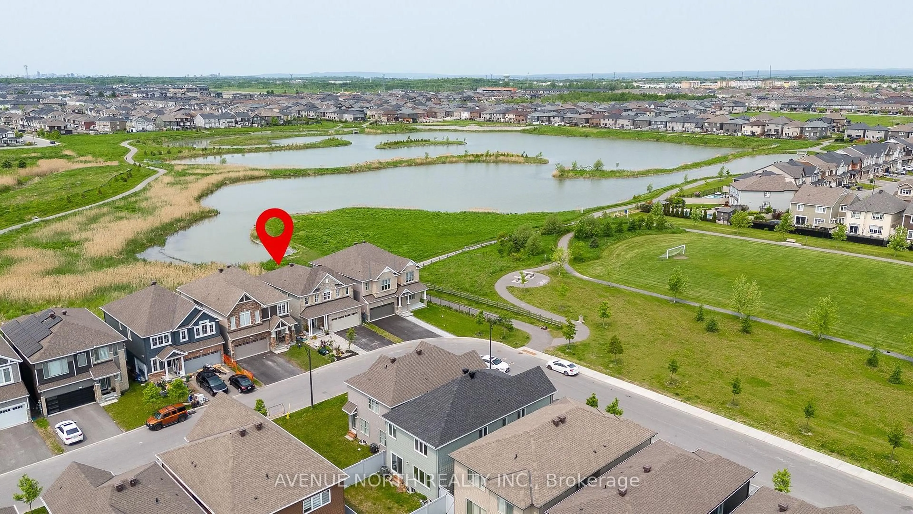 A pic from outside/outdoor area/front of a property/back of a property/a pic from drone, water/lake/river/ocean view for 822 Henslows Circ, Orleans Ontario K4A 5H6