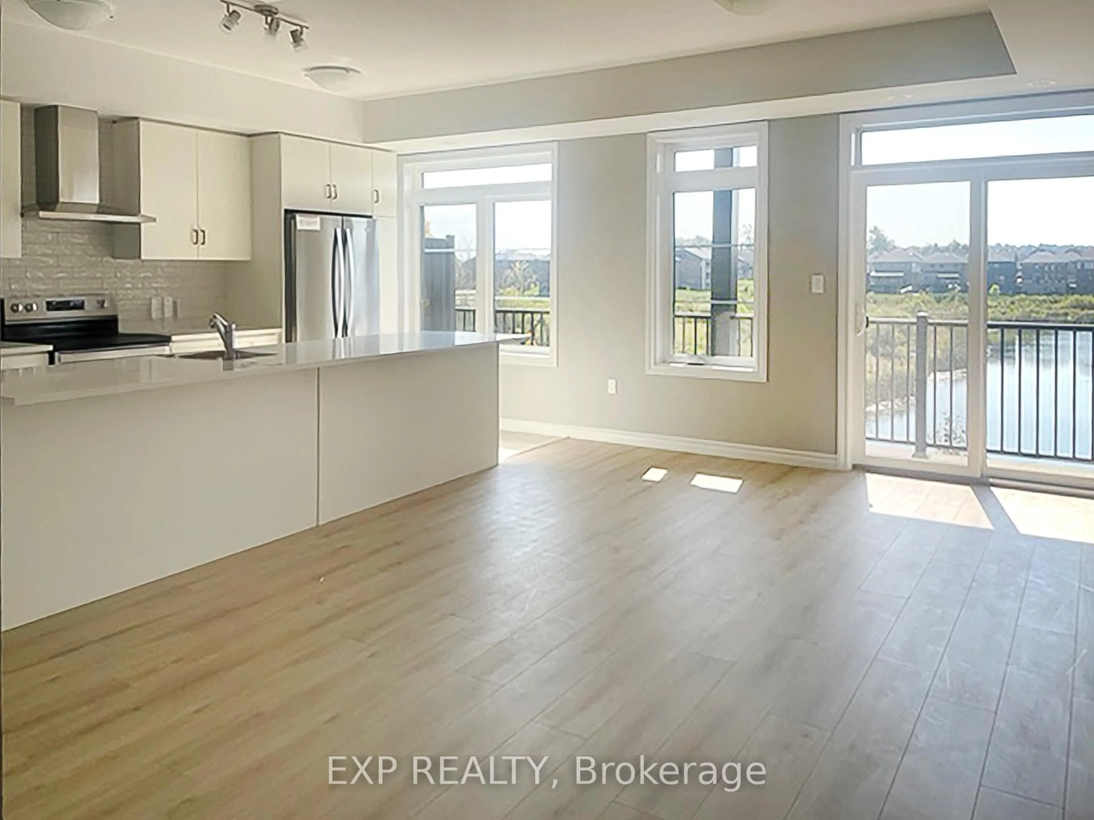 Open concept kitchen, wood/laminate floor for 104 Lomond Lane, Kitchener Ontario N2R 0T6