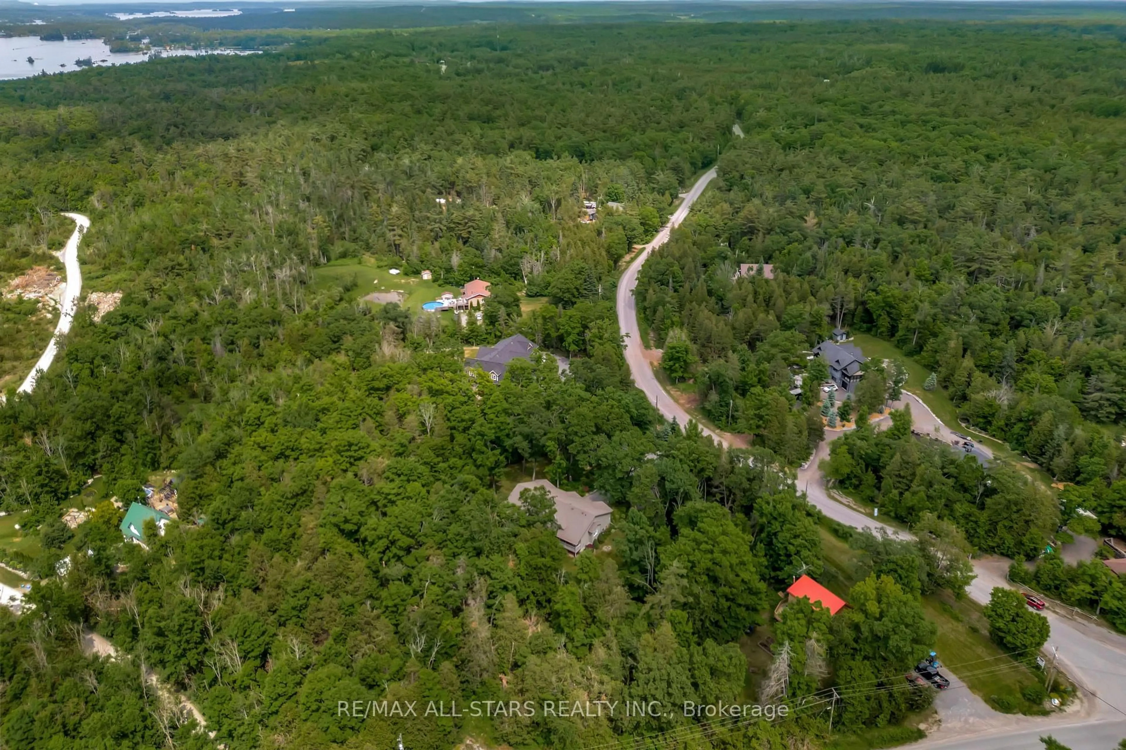 A pic from outside/outdoor area/front of a property/back of a property/a pic from drone, forest/trees view for 536 Golf Course Rd, Douro-Dummer Ontario K0L 2H0