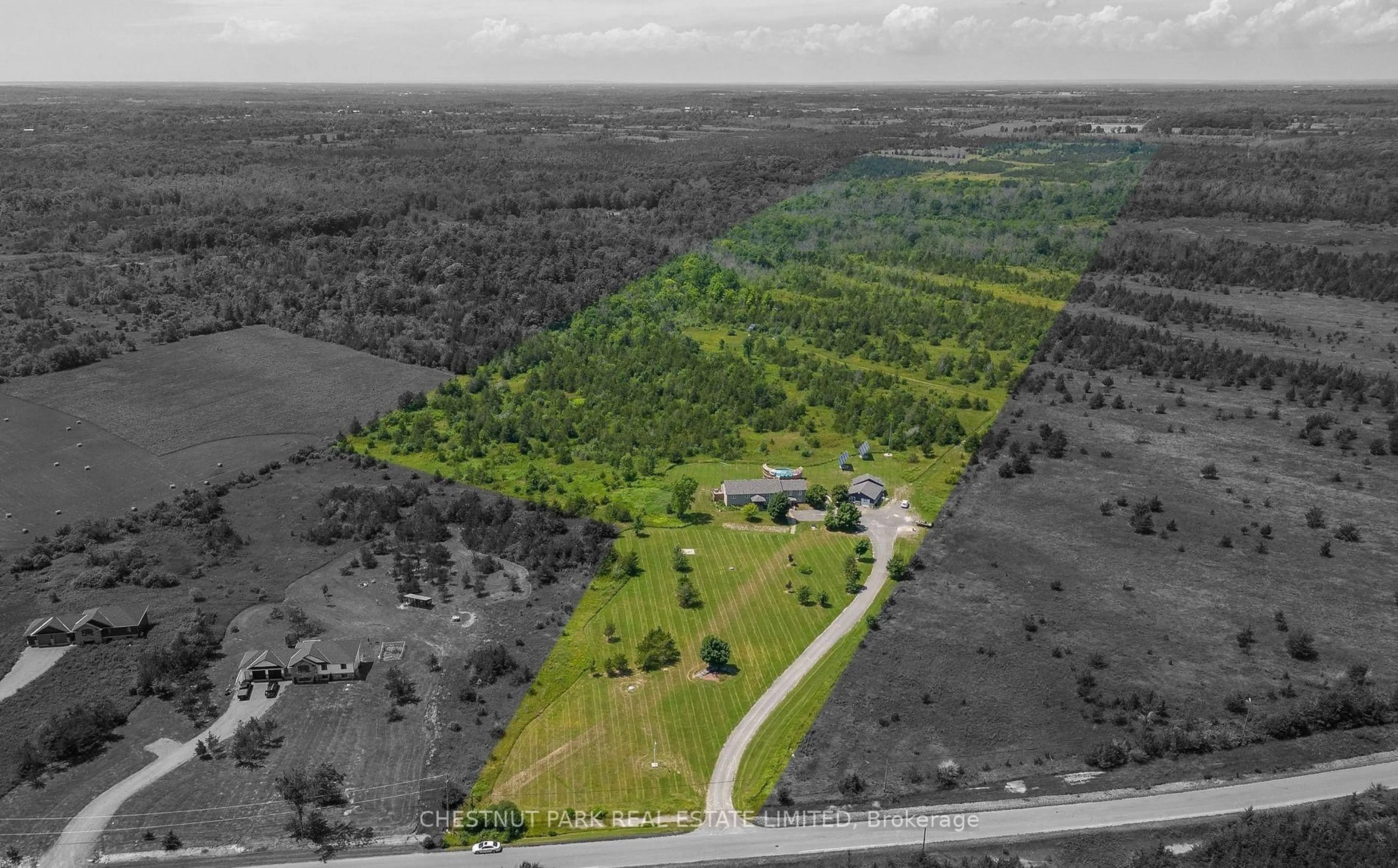 A pic from outside/outdoor area/front of a property/back of a property/a pic from drone, forest/trees view for 1398 Old Milford Rd, Prince Edward County Ontario K0K 2T0