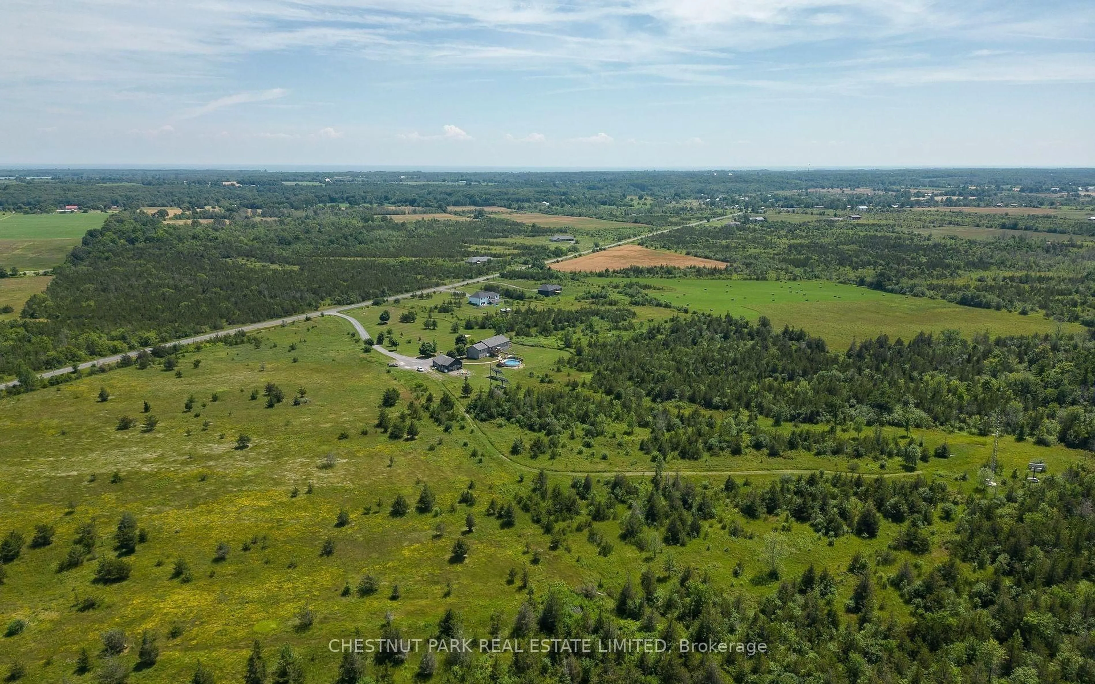 A pic from outside/outdoor area/front of a property/back of a property/a pic from drone, forest/trees view for 1398 Old Milford Rd, Prince Edward County Ontario K0K 2T0
