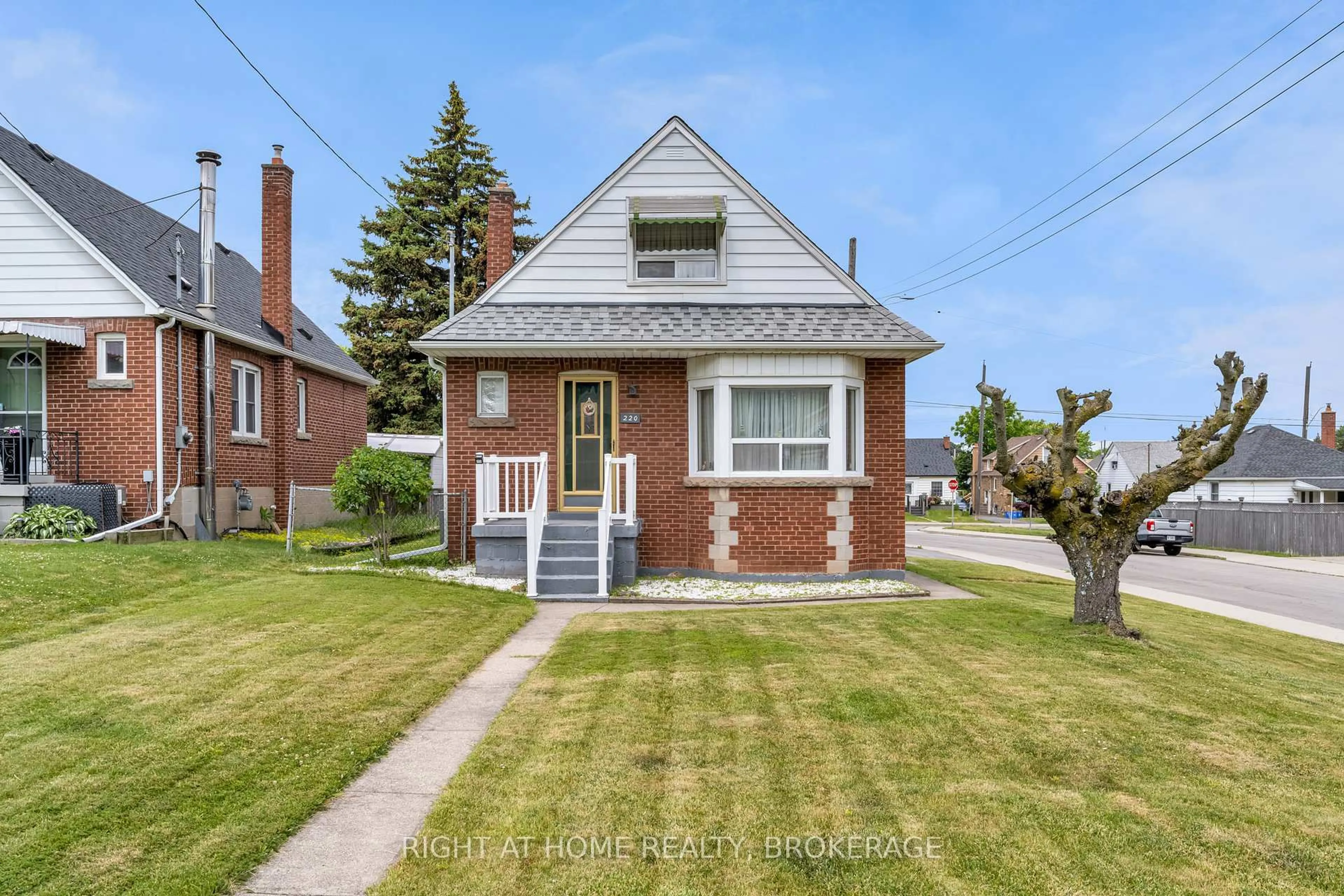 Home with brick exterior material, street for 220 Rodgers Rd, Hamilton Ontario L8K 3C5