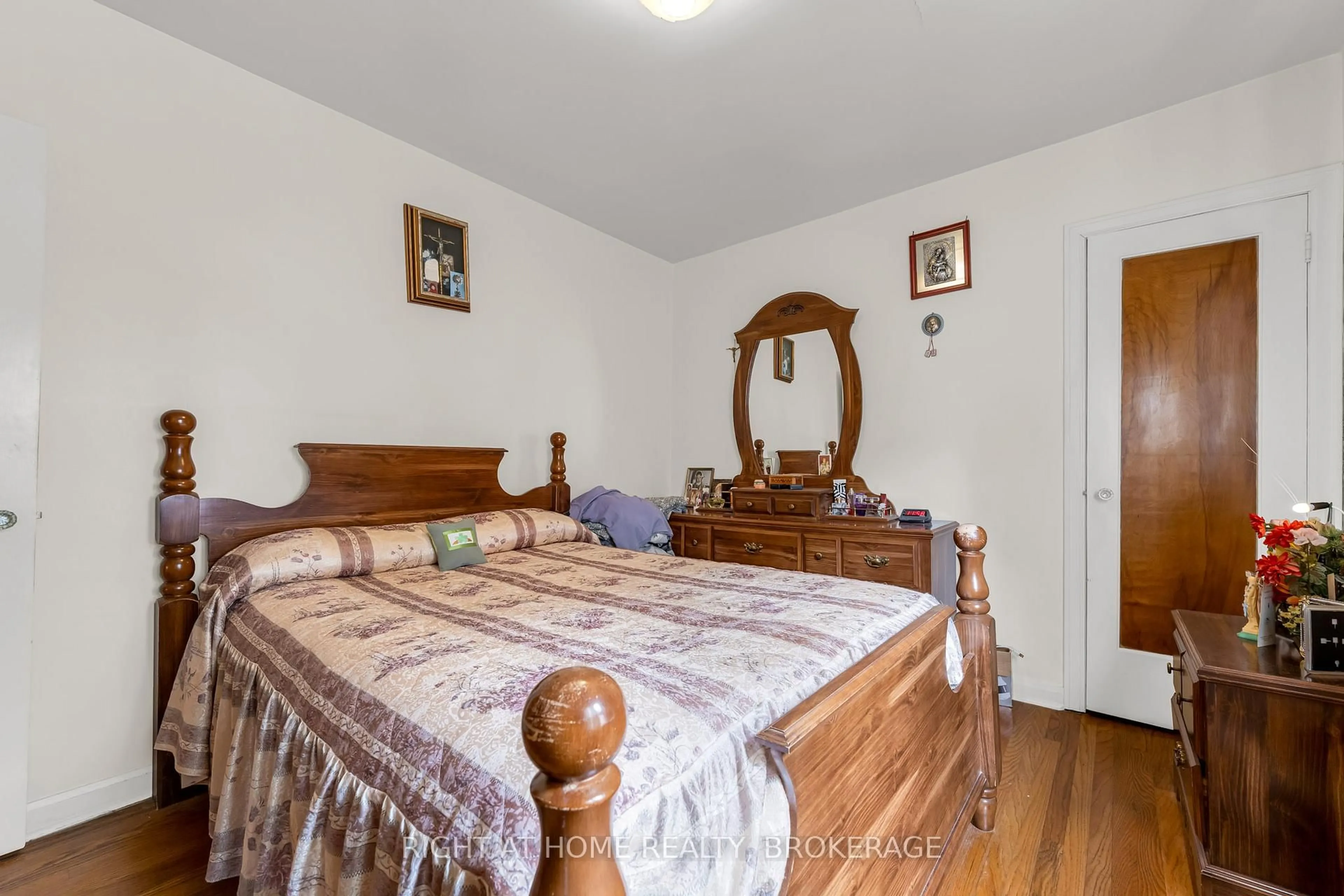 Bedroom with bed, wood/laminate floor for 220 Rodgers Rd, Hamilton Ontario L8K 3C5