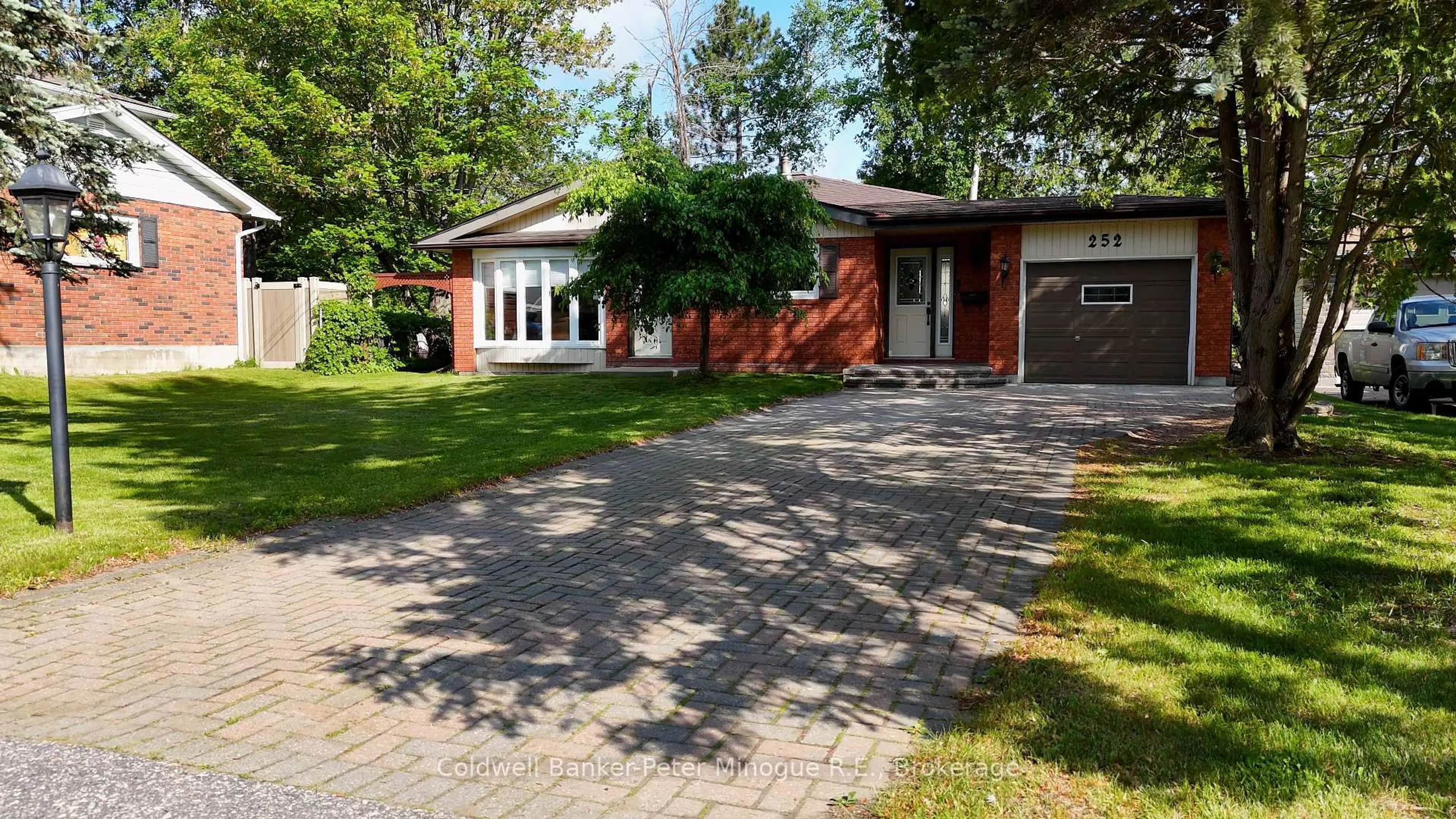 Home with brick exterior material, street for 252 Orange Cres, North Bay Ontario P1A 3A9