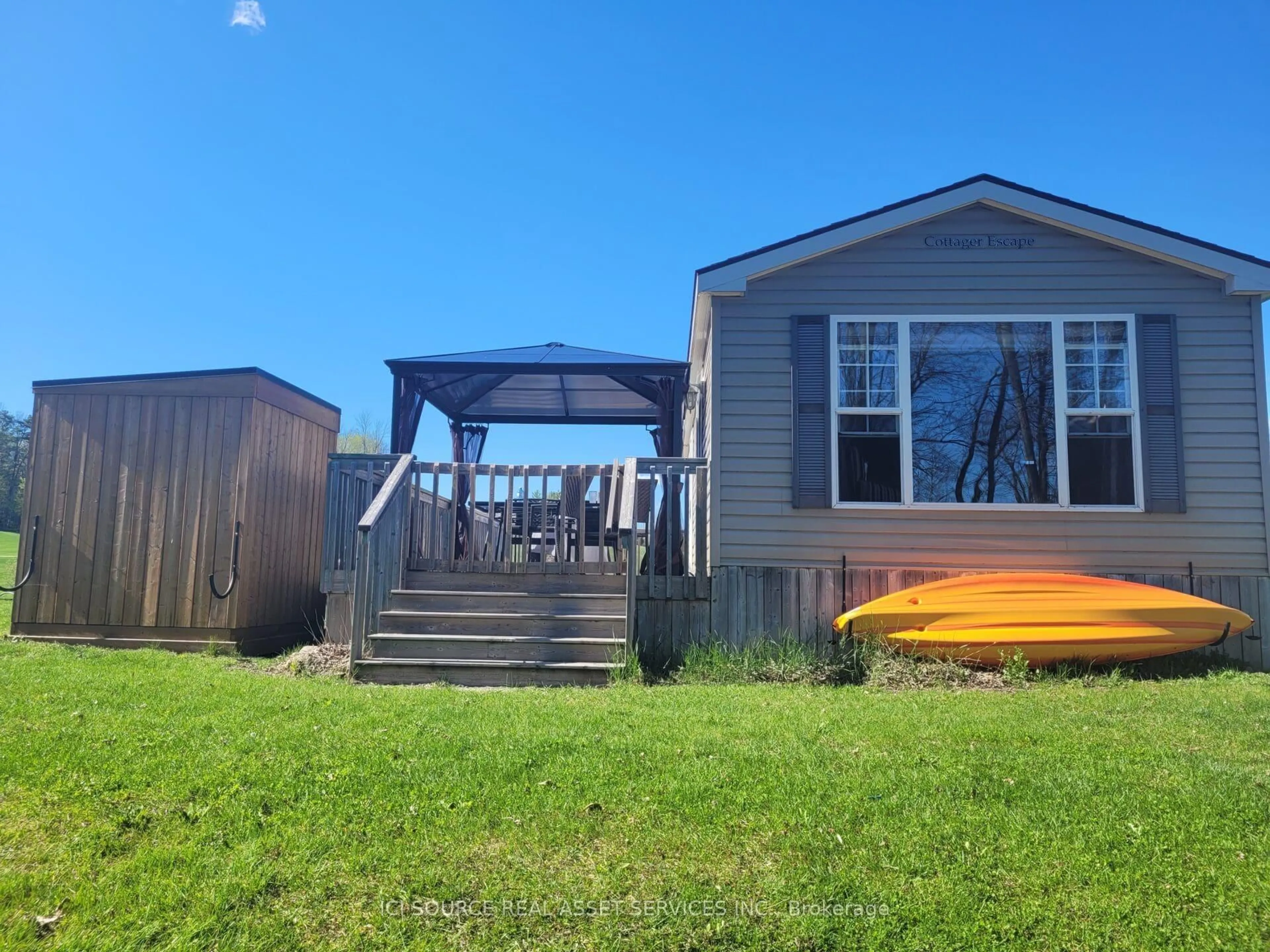A pic from outside/outdoor area/front of a property/back of a property/a pic from drone, water/lake/river/ocean view for 1235 Villiers Line #GDFR025, Otonabee-South Monaghan Ontario K0L 2G0