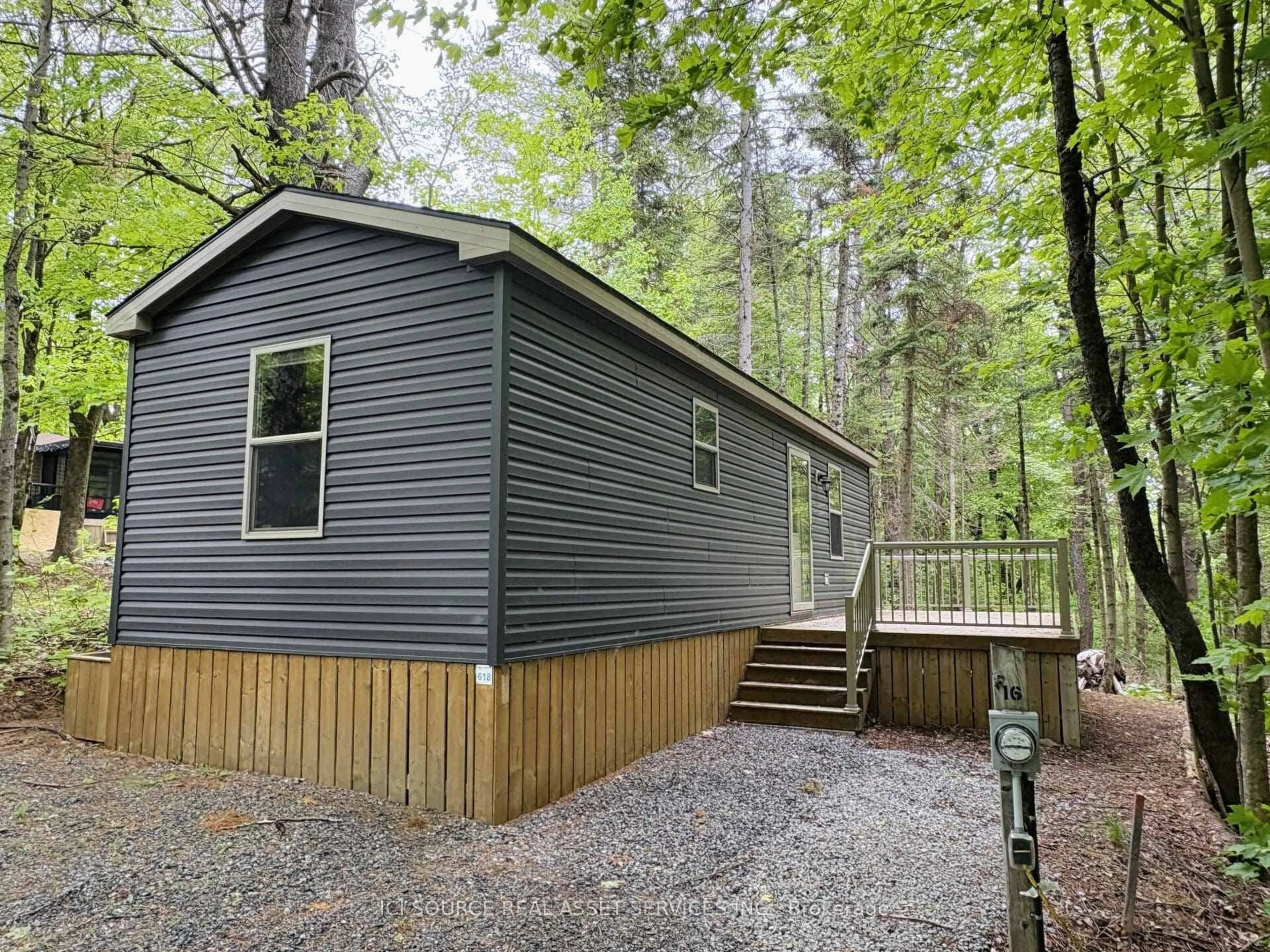 Home with vinyl exterior material, forest/trees view for 1047 Bonnie Lake Camp Rd #BOH618, Bracebridge Ontario P1L 1W9