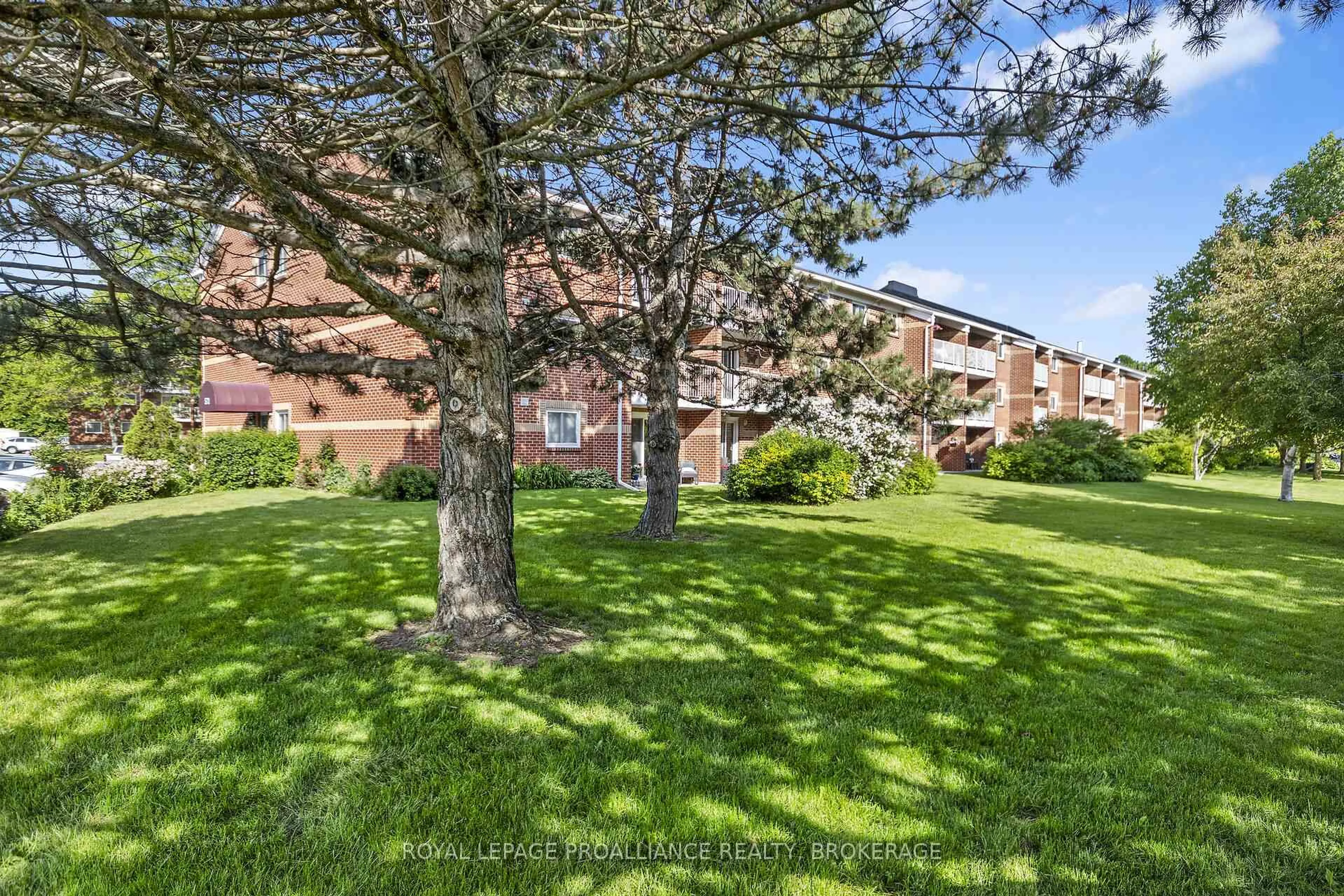 Patio, street for 573 Armstrong Rd #101, Kingston Ontario K7M 8J8